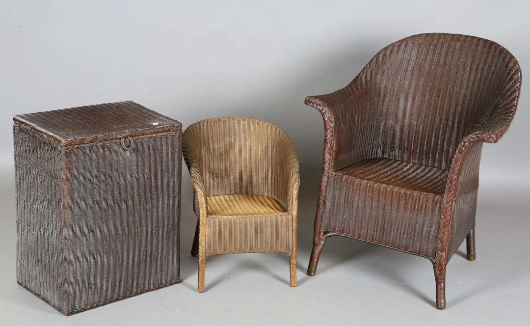A Lloyd Loom tub back armchair, height 84cm, width 71cm, together