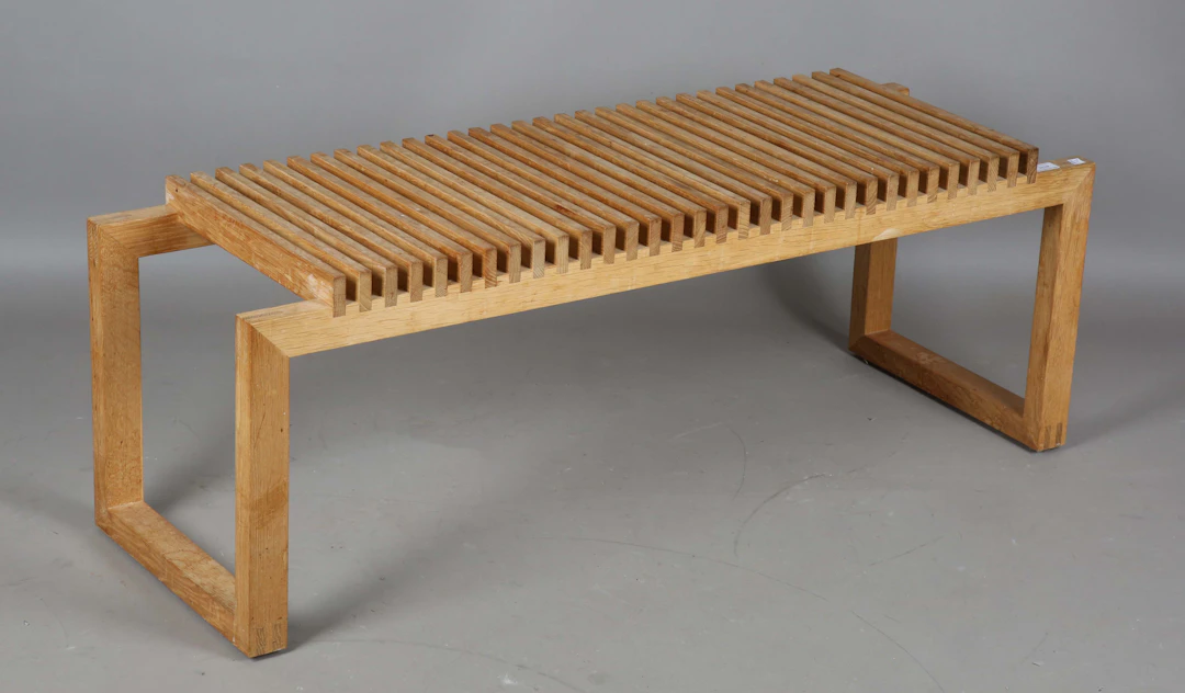 A modern Skagerak oak slatted 'cutter' bench, designed by Niels Hvass