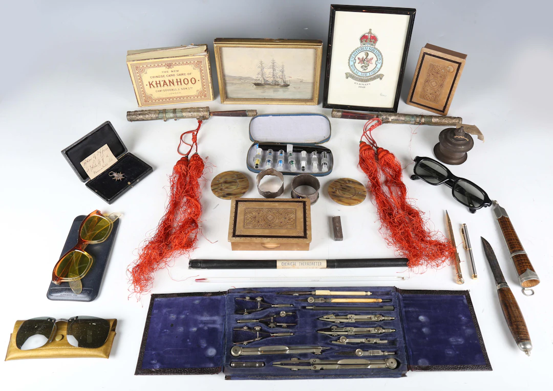 A mixed group of collectors' items, including two silver napkin rings