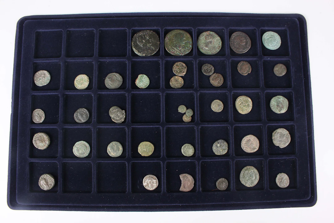 A collection of Roman bronze and copper alloy coinage, including a