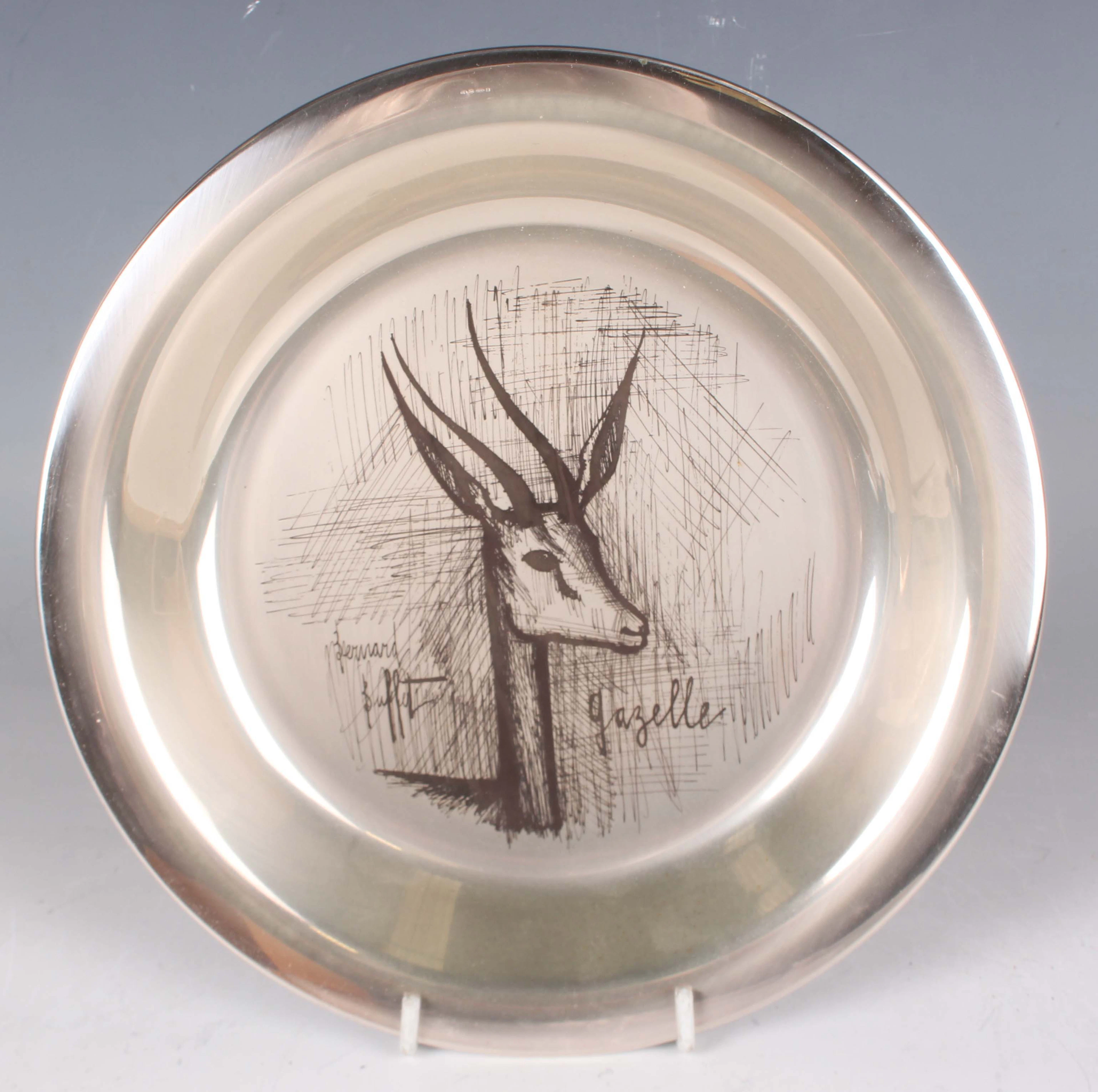 A French sterling silver collector's plate, decorated with a titled