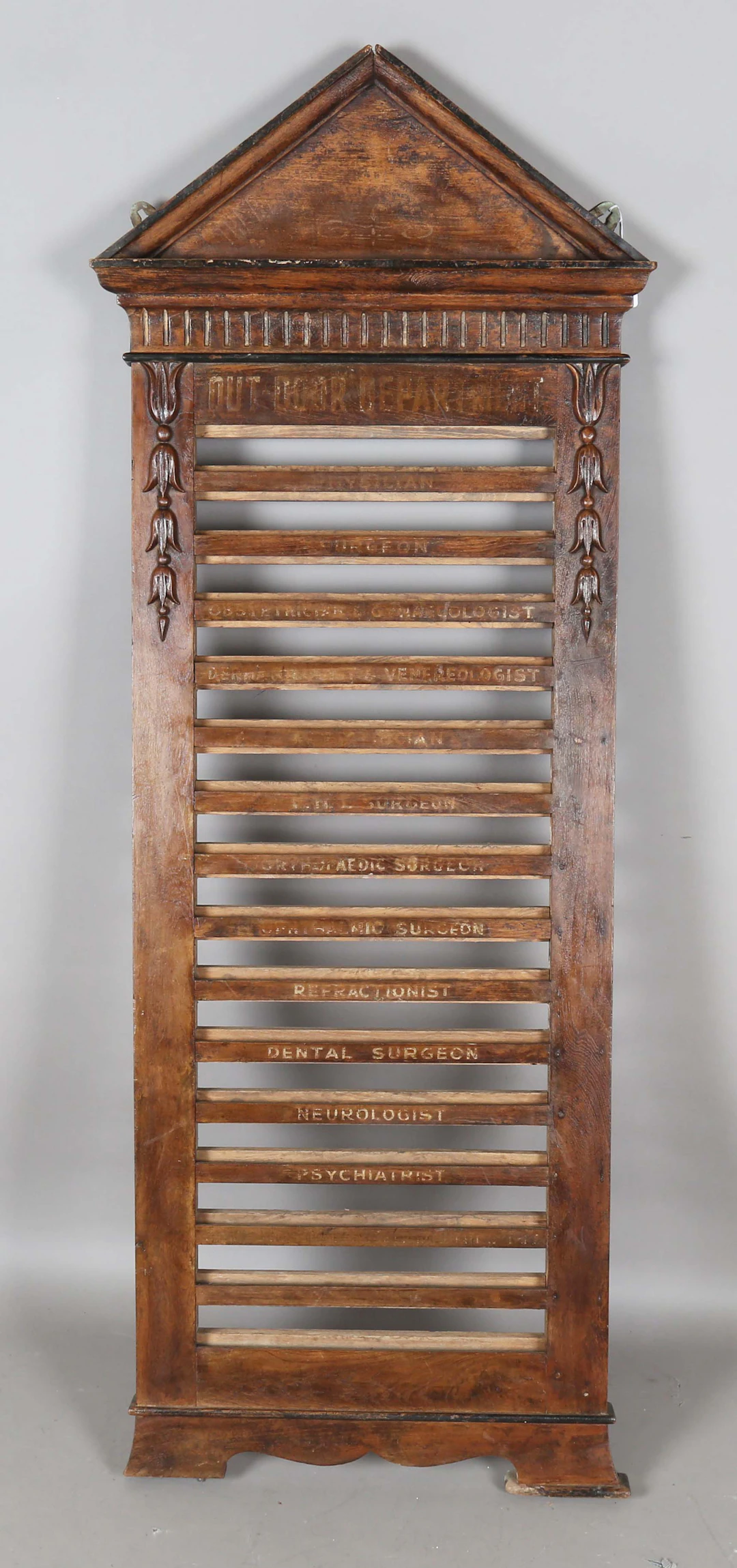 A late Victorian walnut framed 'Out Door Department' hospital information