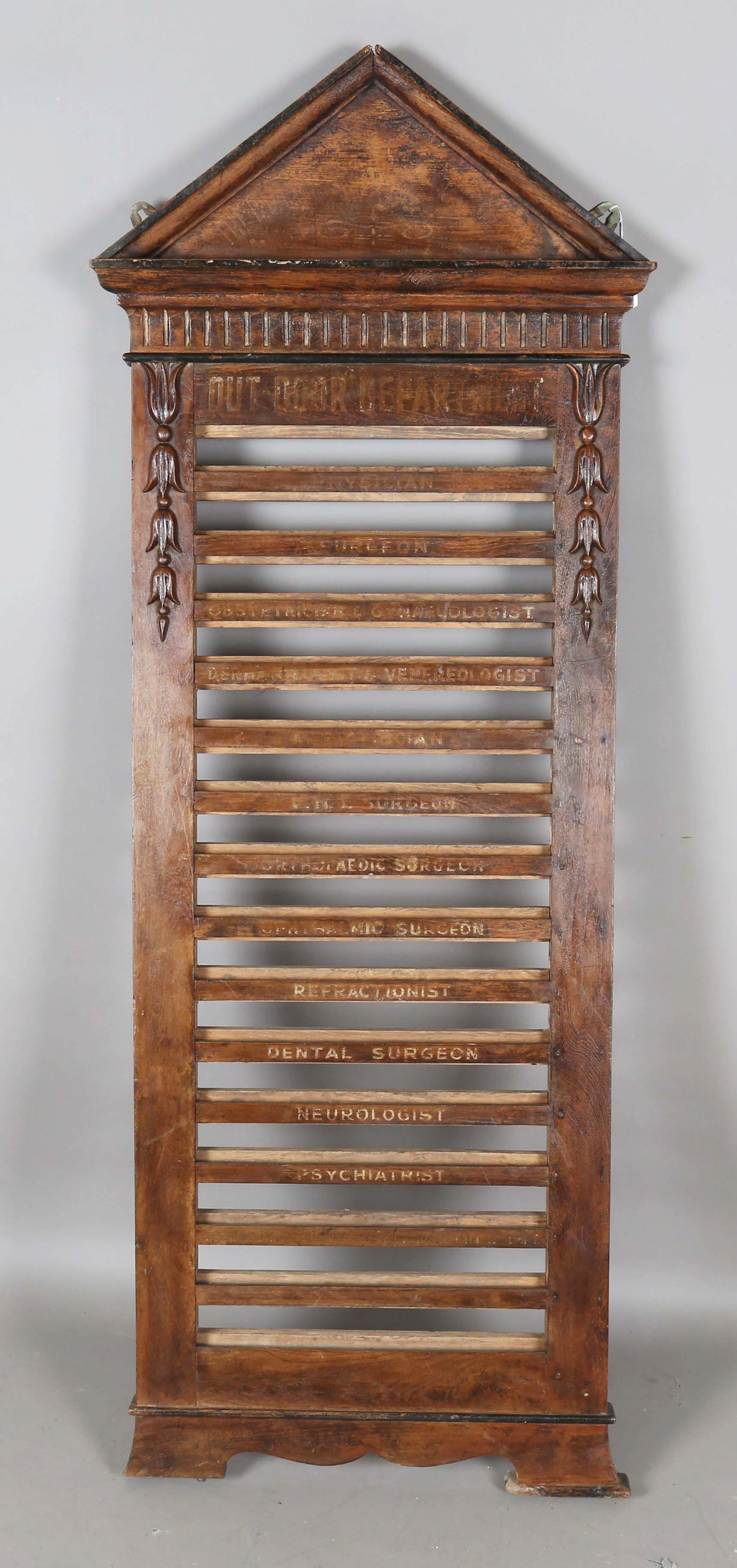 A late Victorian walnut framed 'Out Door Department' hospital information