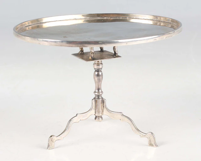 An early 18th century Dutch miniature toy silver oval tilt-top table