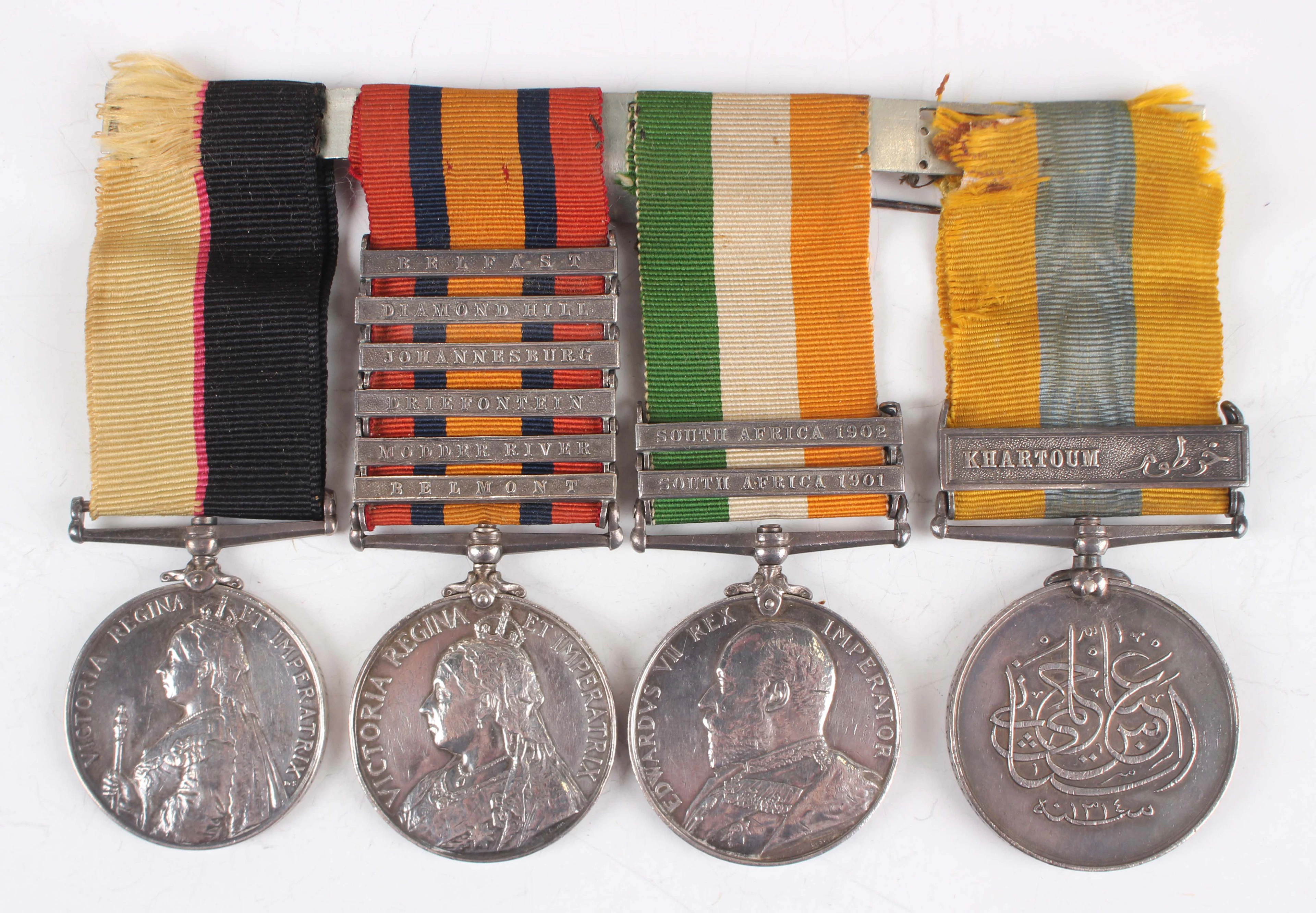 A group of four medals, comprising Queen’s Sudan Medal to ‘3210, Sergt