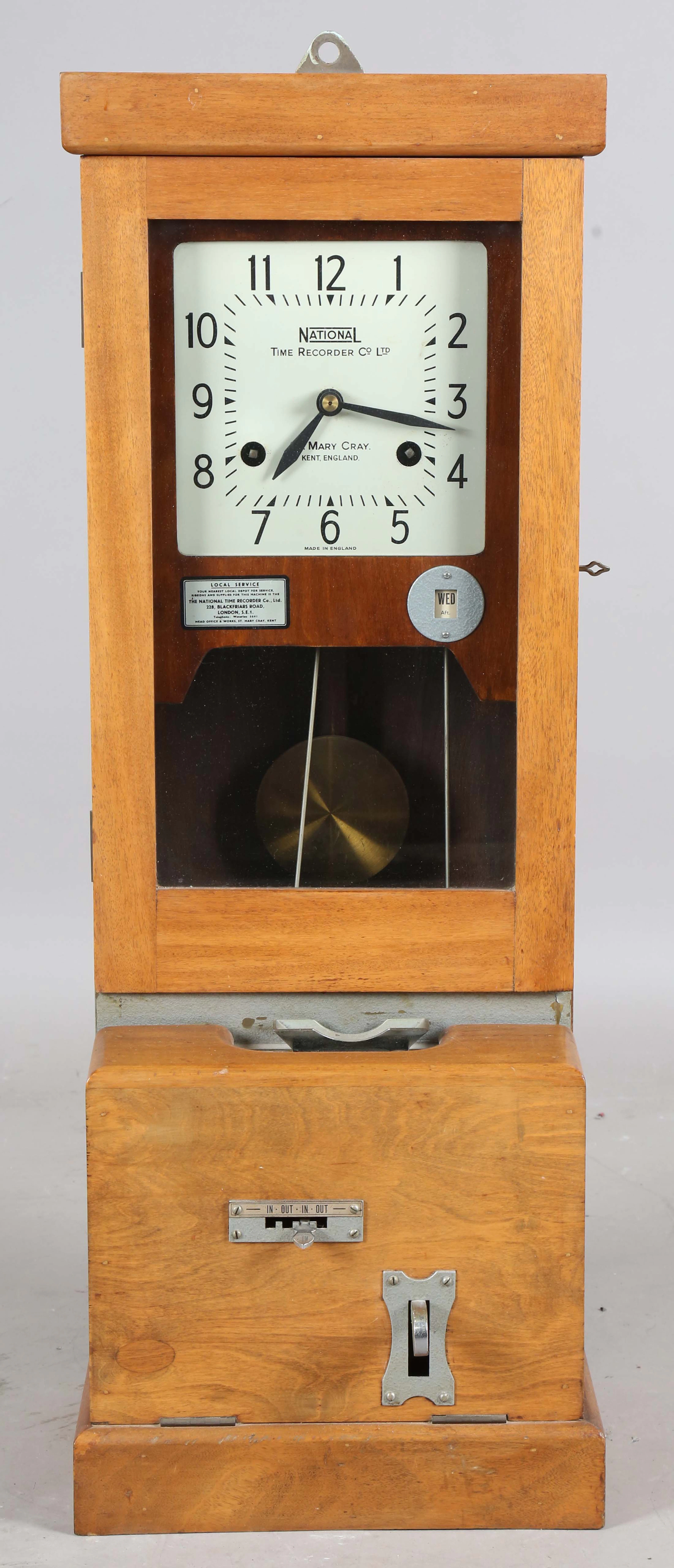 A National Time Recorder Co Ltd clocking-in clock, the signed square