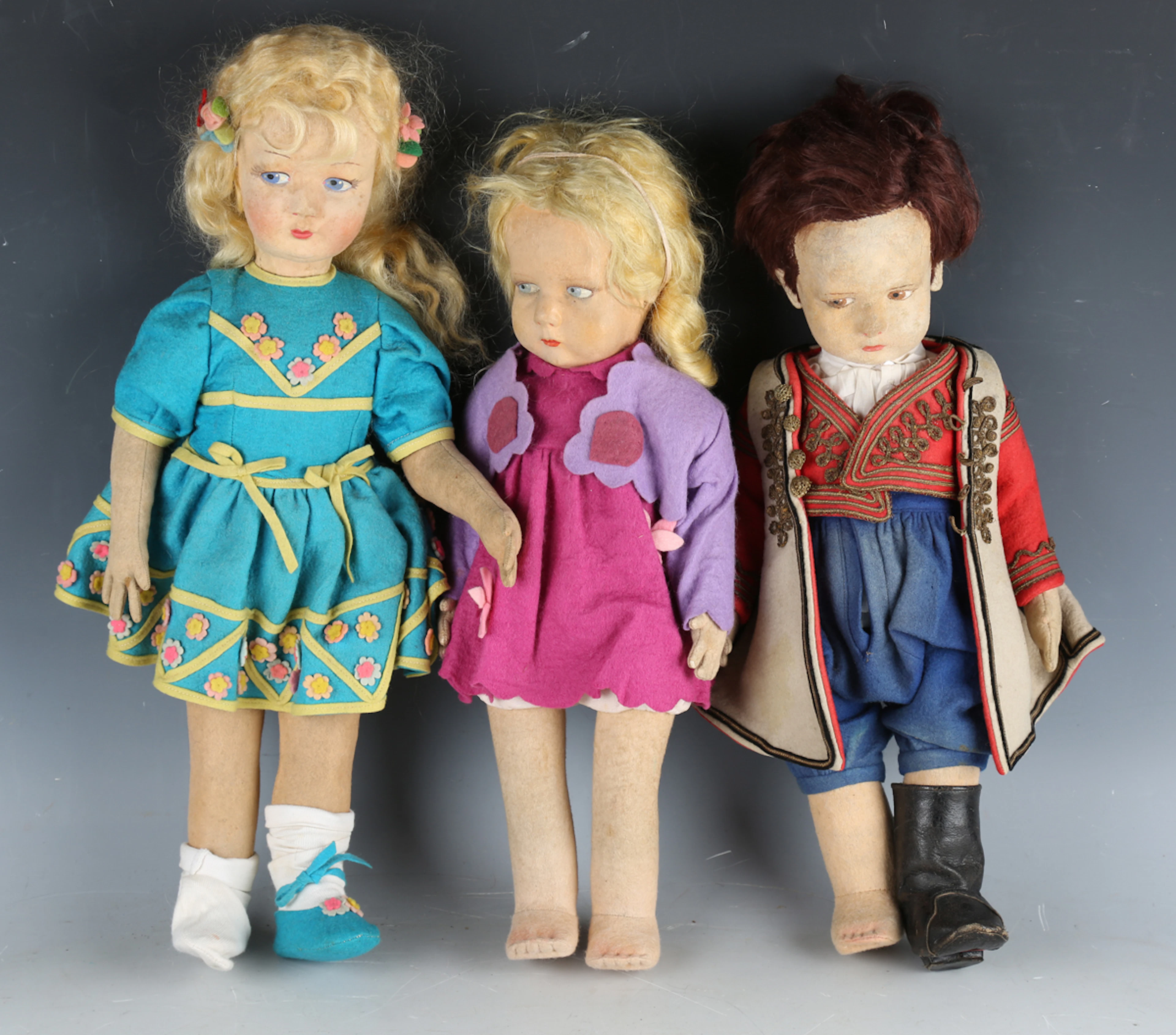 Three Lenci felt dolls, comprising two girl dolls with blonde hair