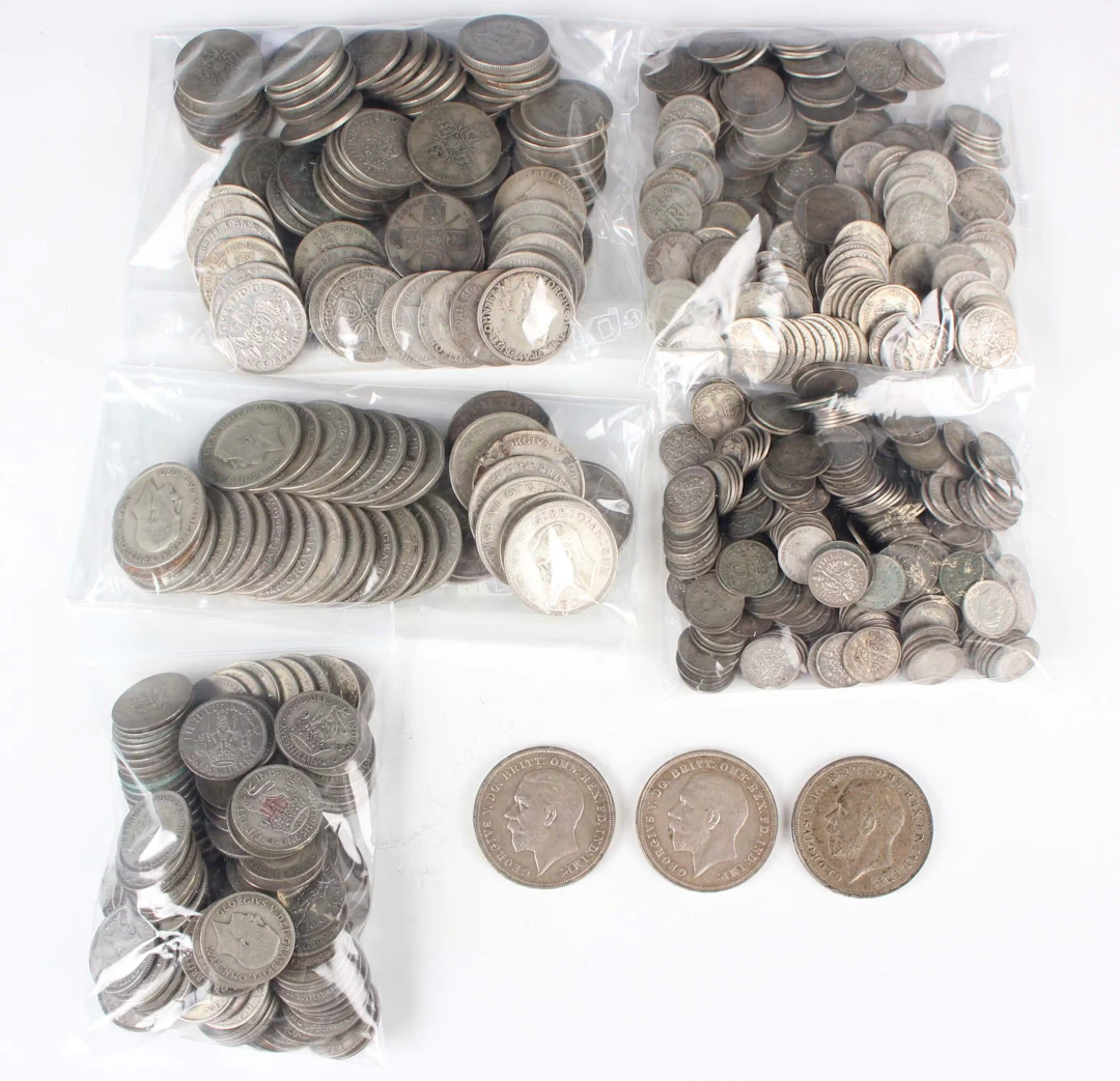 A large collection of pre-1947 British silver nickel coinage, including