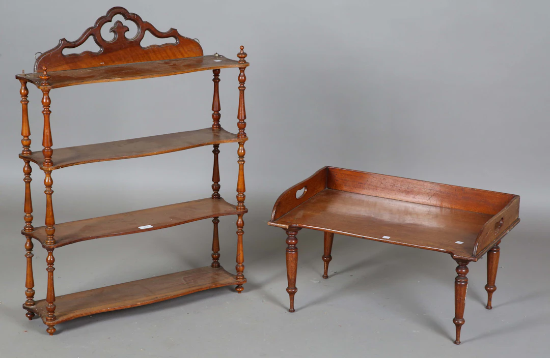A mid-Victorian walnut four-tier wall shelf, height 85cm, width 65cm