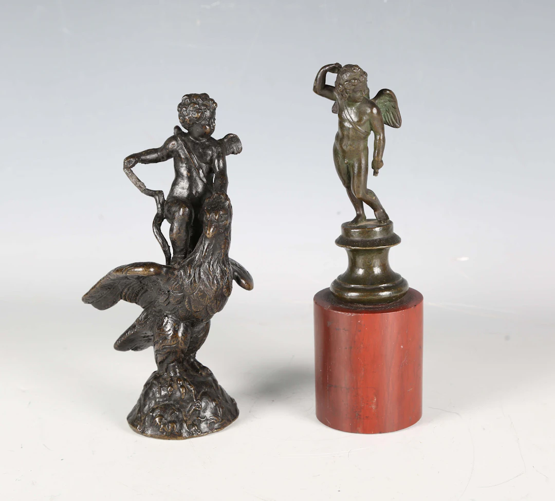 A 17th century Italian style darkly patinated cast bronze figure of