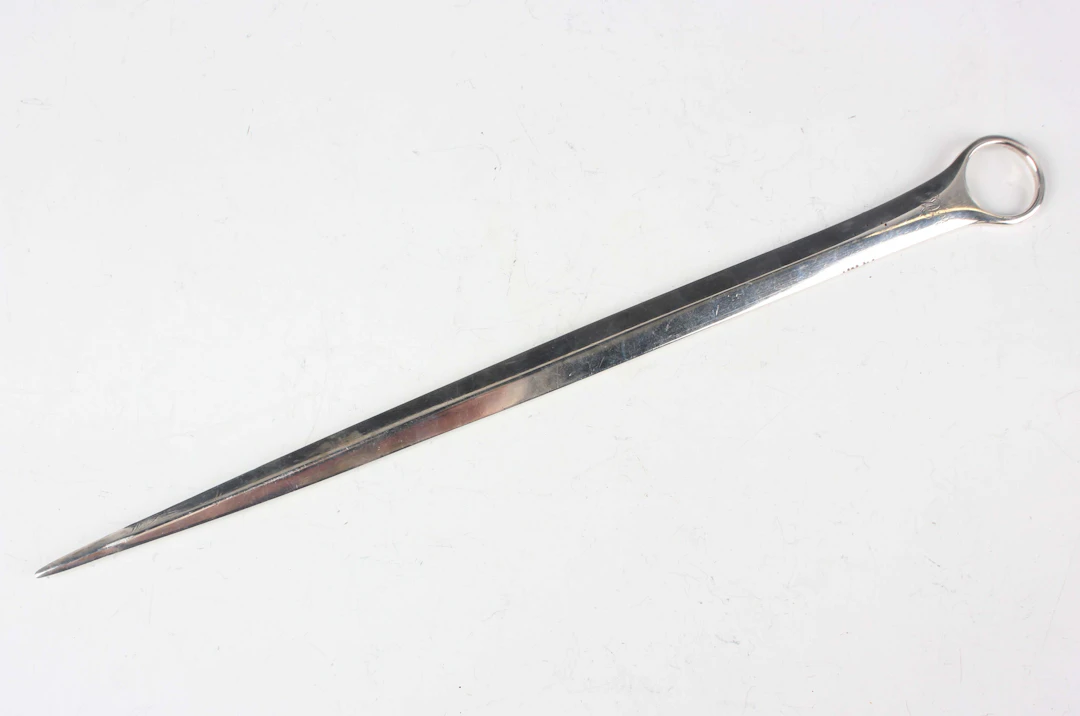 A George III silver meat skewer with ring terminal, monogram engraved