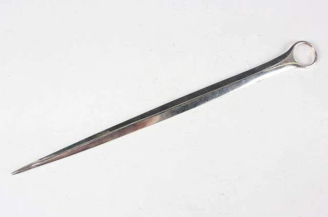 A George III silver meat skewer with ring terminal, monogram engraved