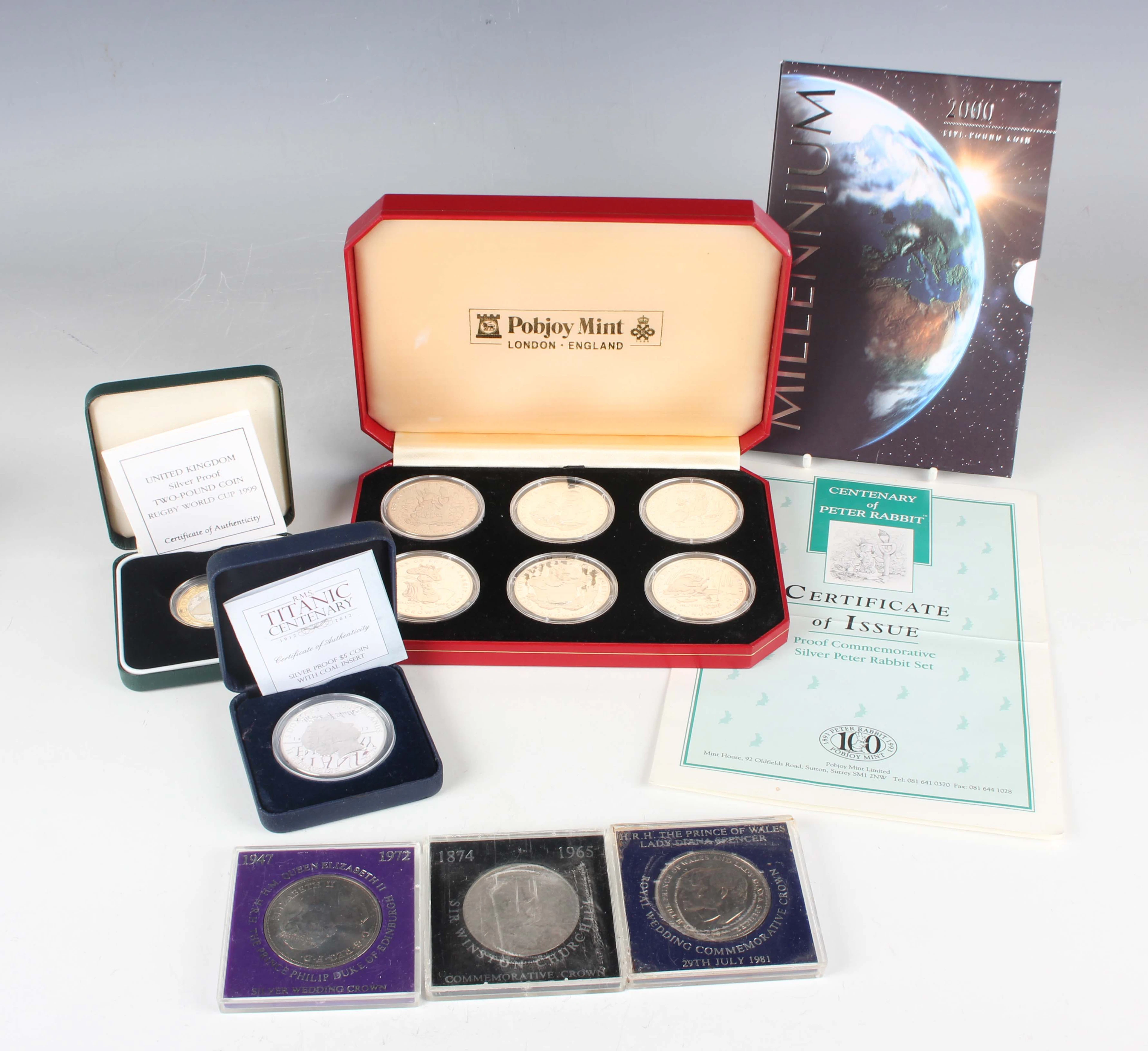 A group of coins, comprising a Cook Islands Elizabeth II silver proof