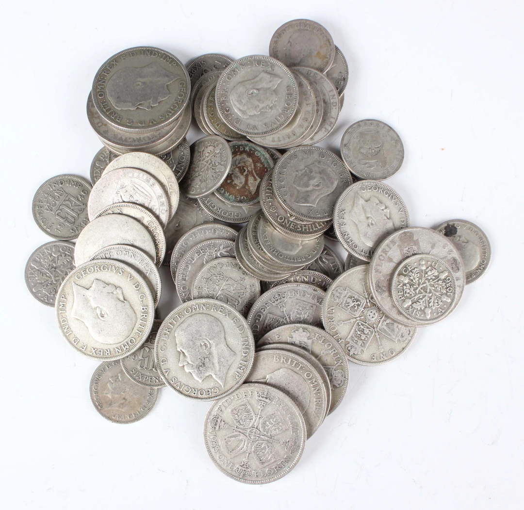 A group of pre-1947 British silver coins, comprising twelve florins