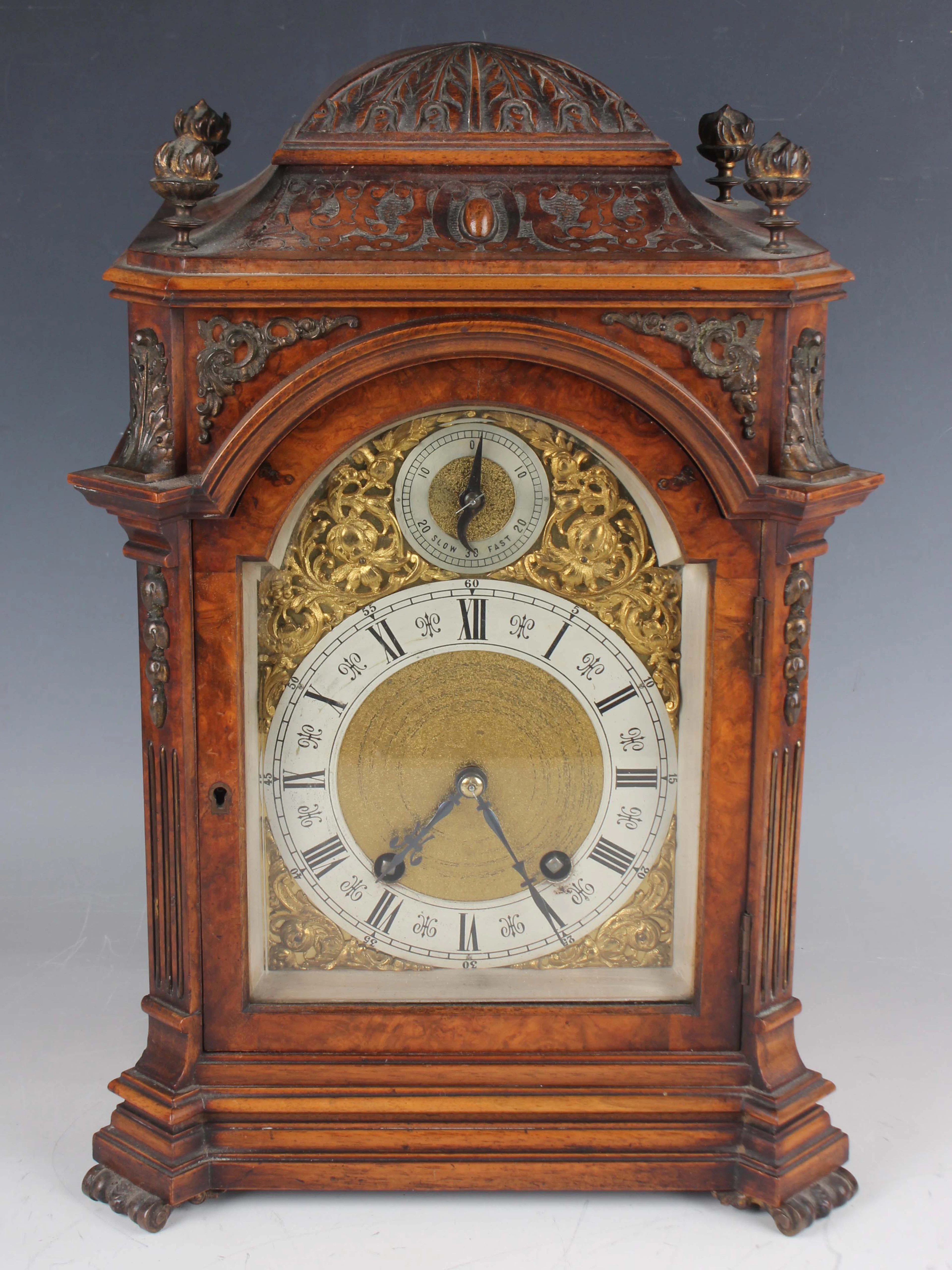 A late 19th century walnut cased mantel clock with Lenzkirch eight