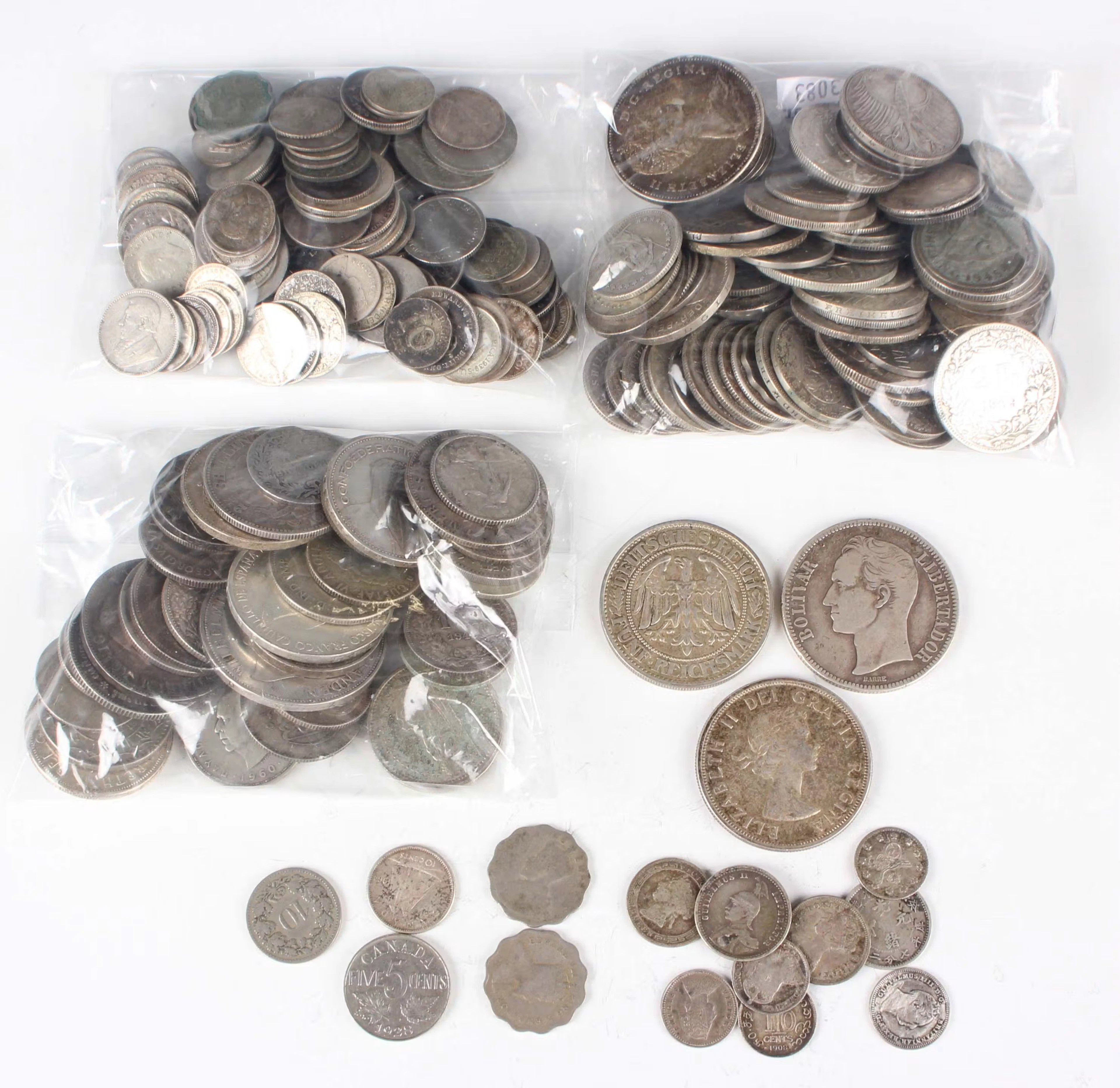 A large collection of mixed European and world debased silver and