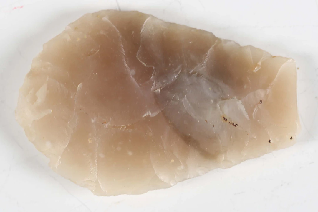 A Neolithic chipped flint leaf arrowhead, purportedly found in West