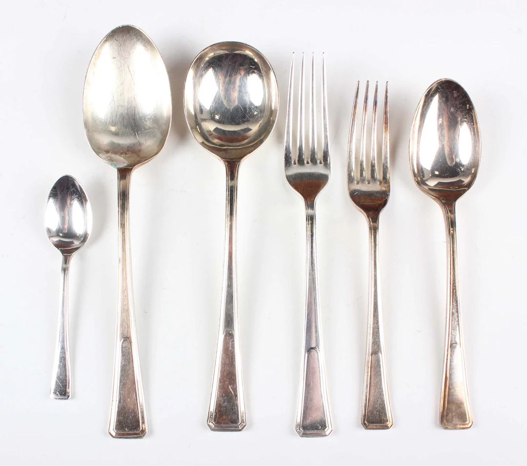 A part canteen of plated Grecian pattern cutlery, comprising three
