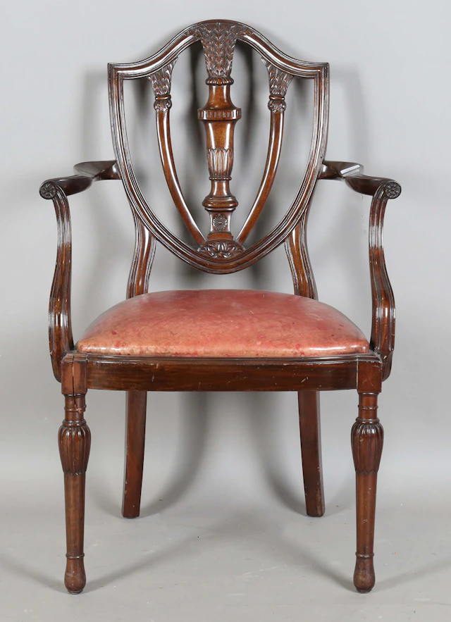 An early 20th century Neoclassical Revival mahogany framed elbow chair