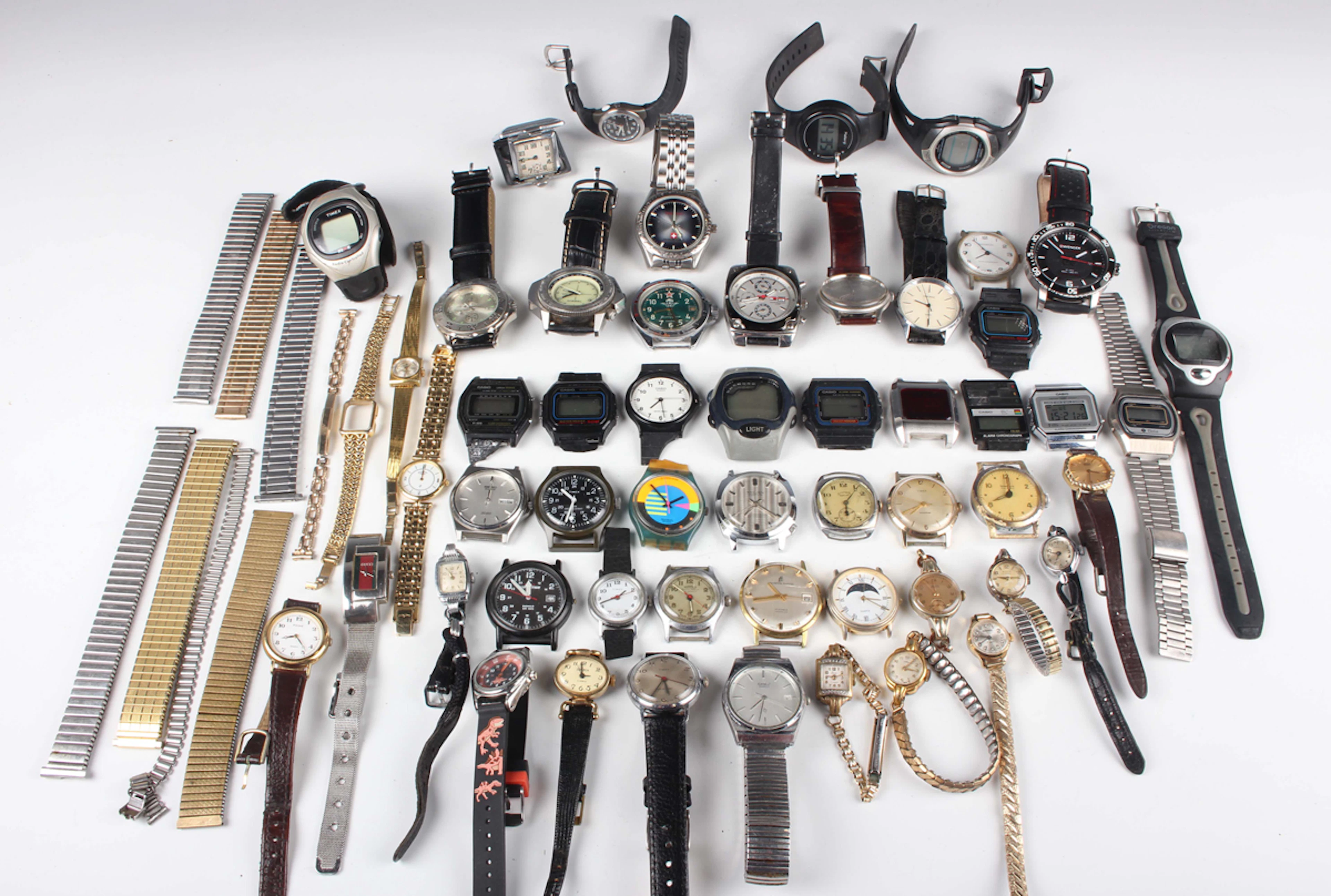 A large collection of ladies' and gentlemen's wristwatches, including
