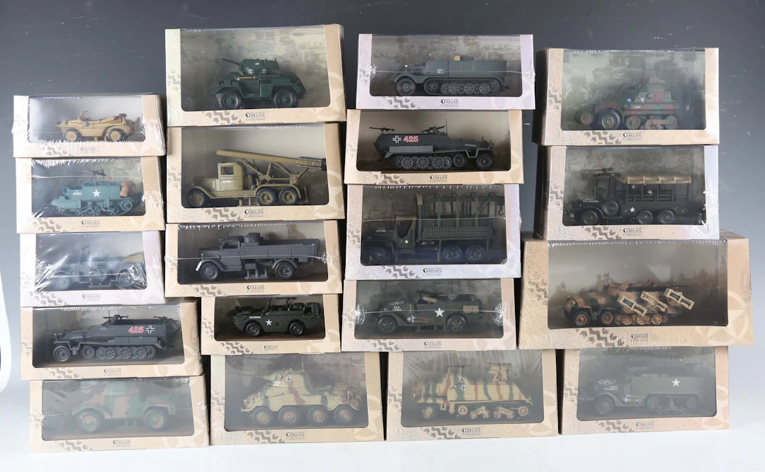 Twenty-eight Atlas Editions military vehicles, including Puma tank