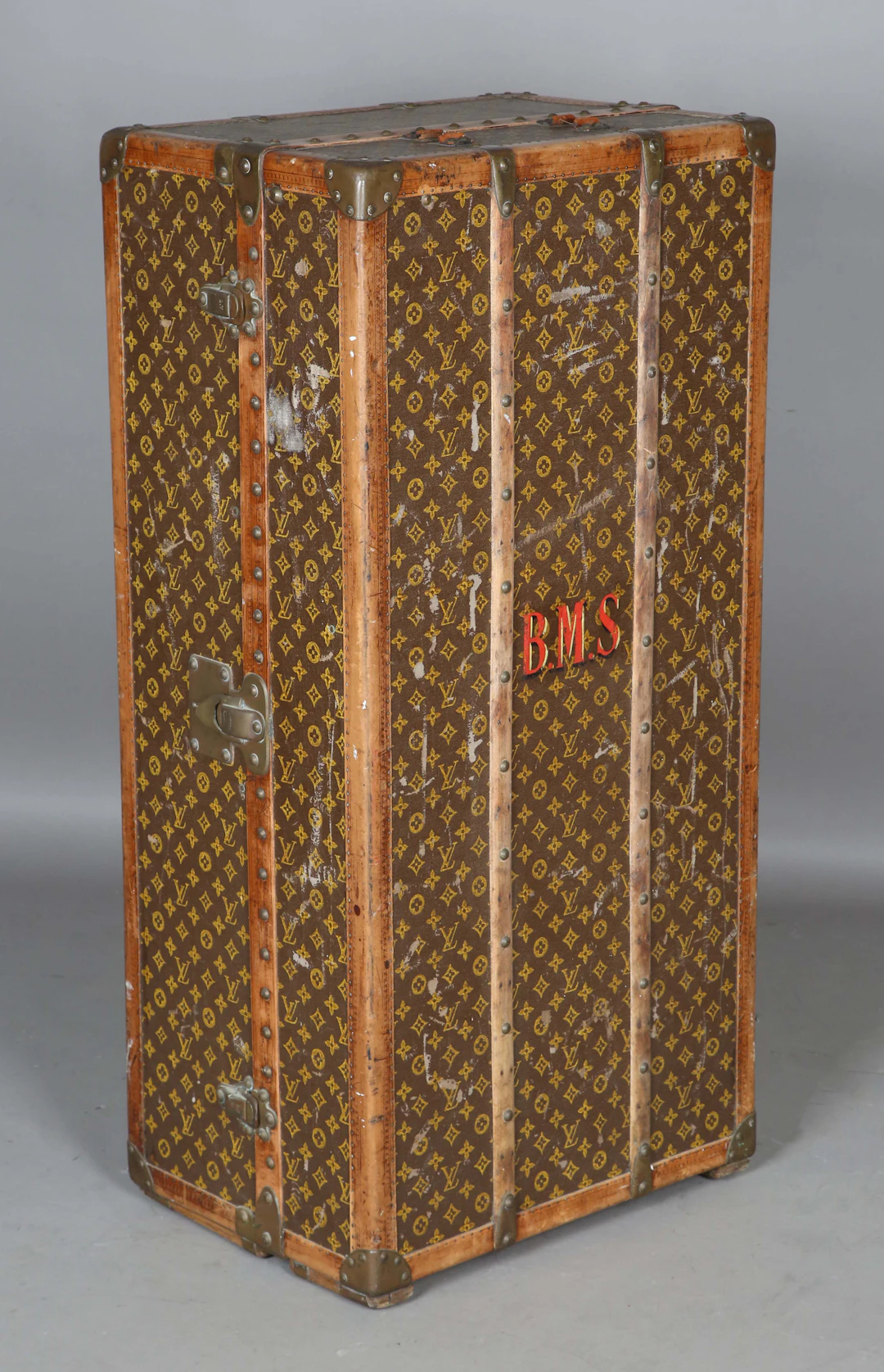 A Louis Vuitton wardrobe trunk with overall monogrammed canvas, leather