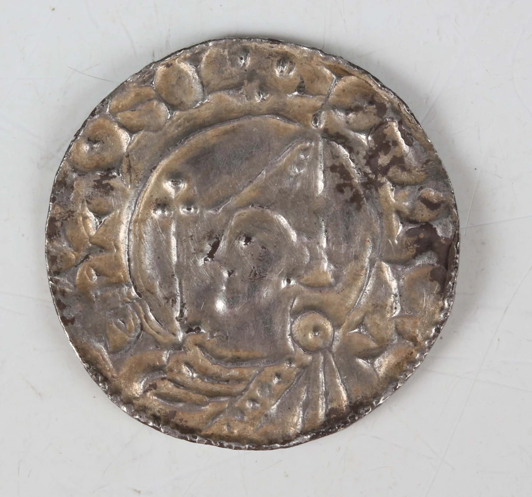 A Cnut hammered silver penny 1016-1035, helmet type, moneyer Matdan