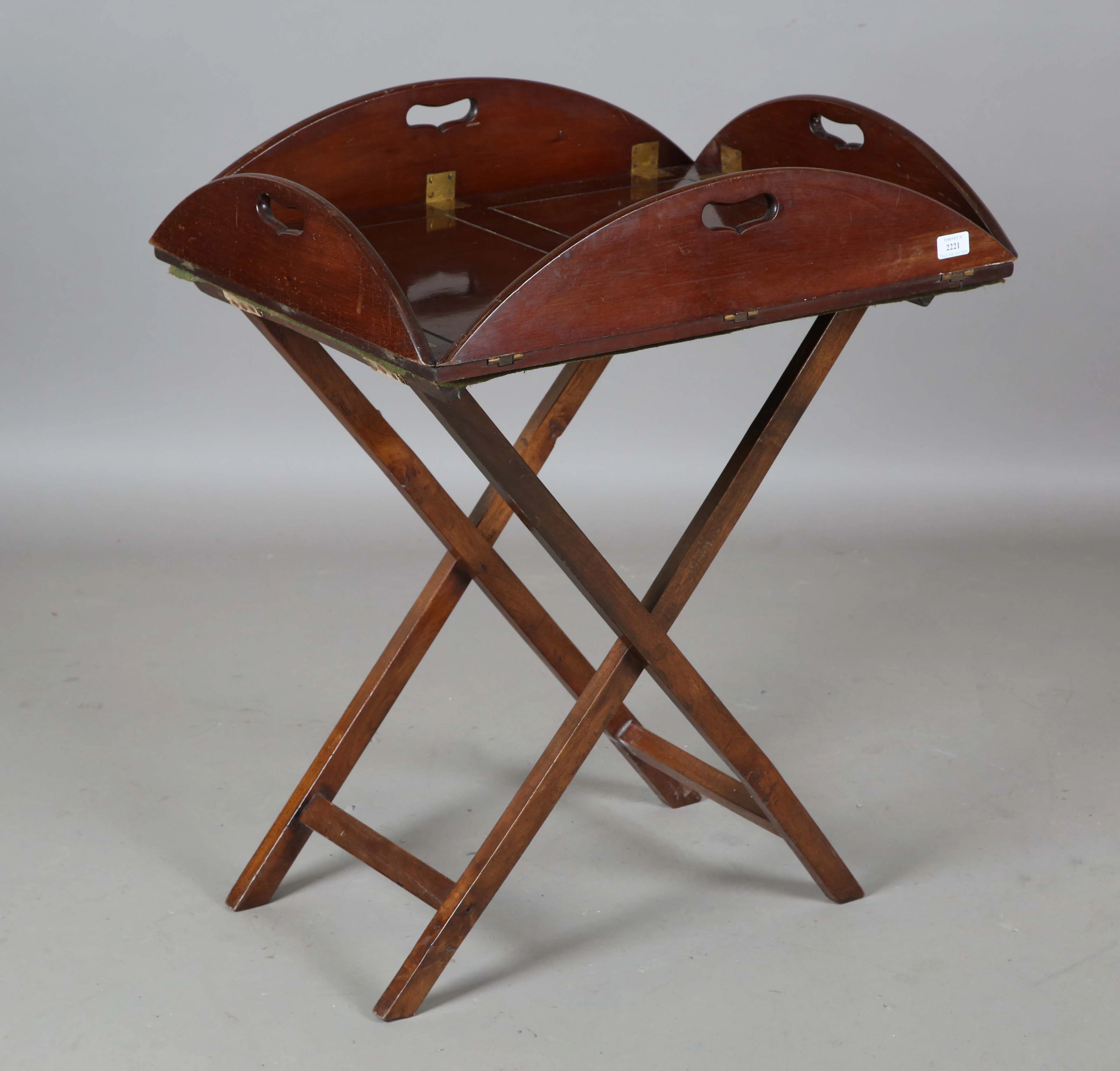 A 19th century mahogany butler's tray with gilt brass hinges and pierced