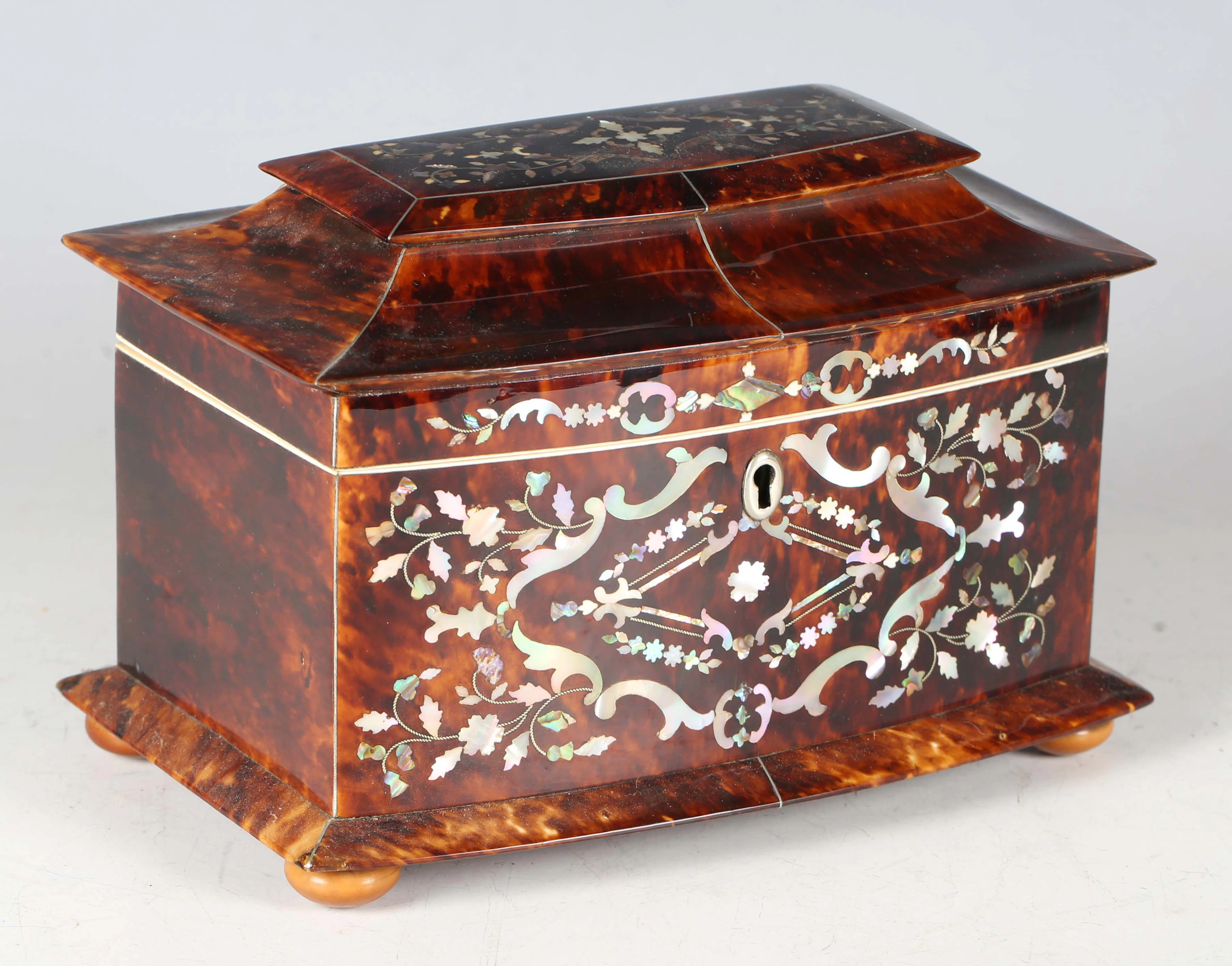 A Regency tortoiseshell tea caddy with a pagoda shaped lid and foliate