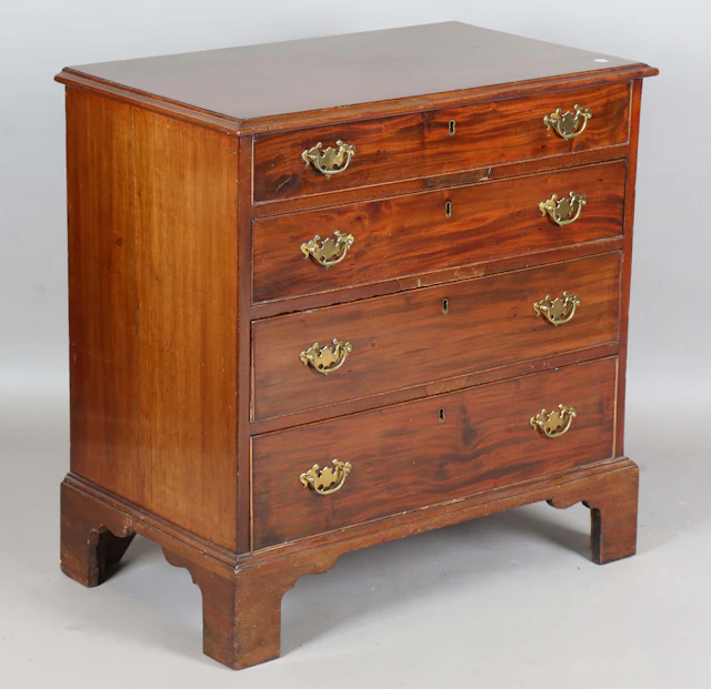 A George III mahogany chest of four graduated oak-lined drawers, height