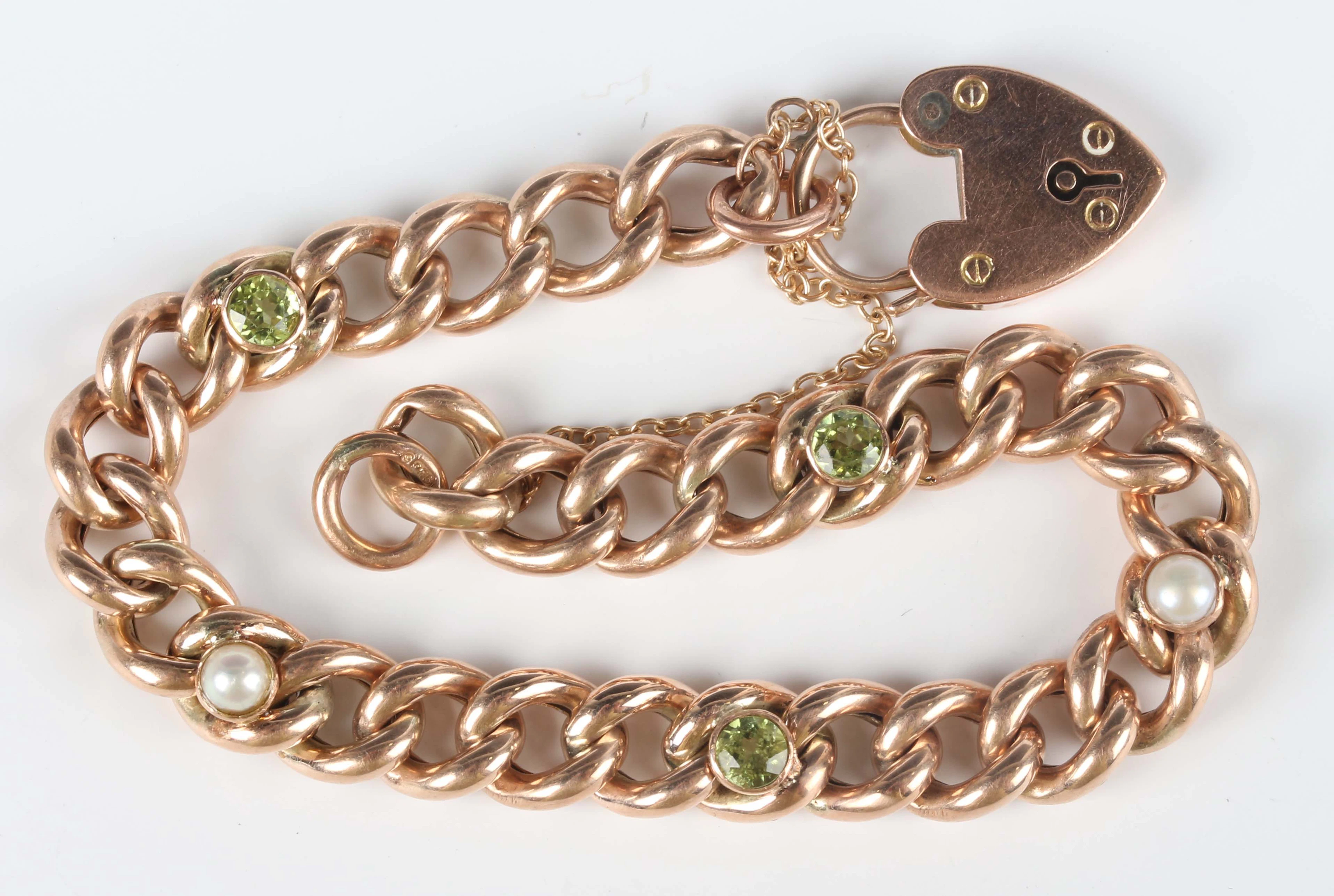 A 9ct gold, peridot and half-pearl curblink bracelet on a gold heart