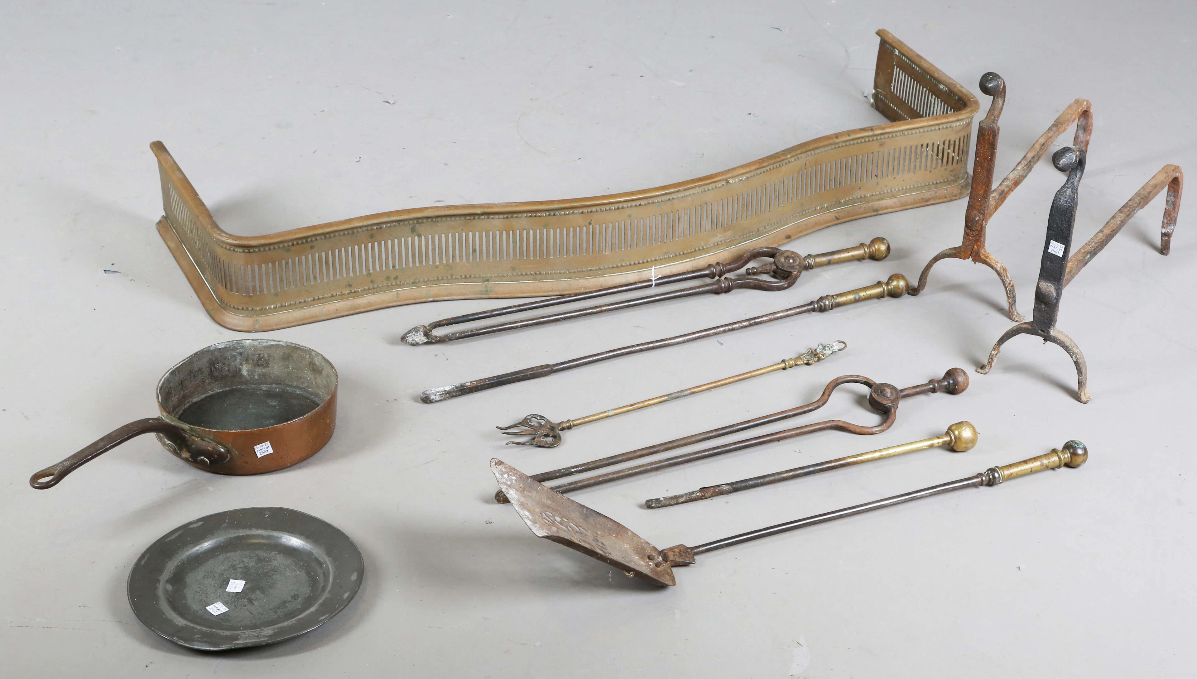 A set of three late George III brass handled and steel fire tools