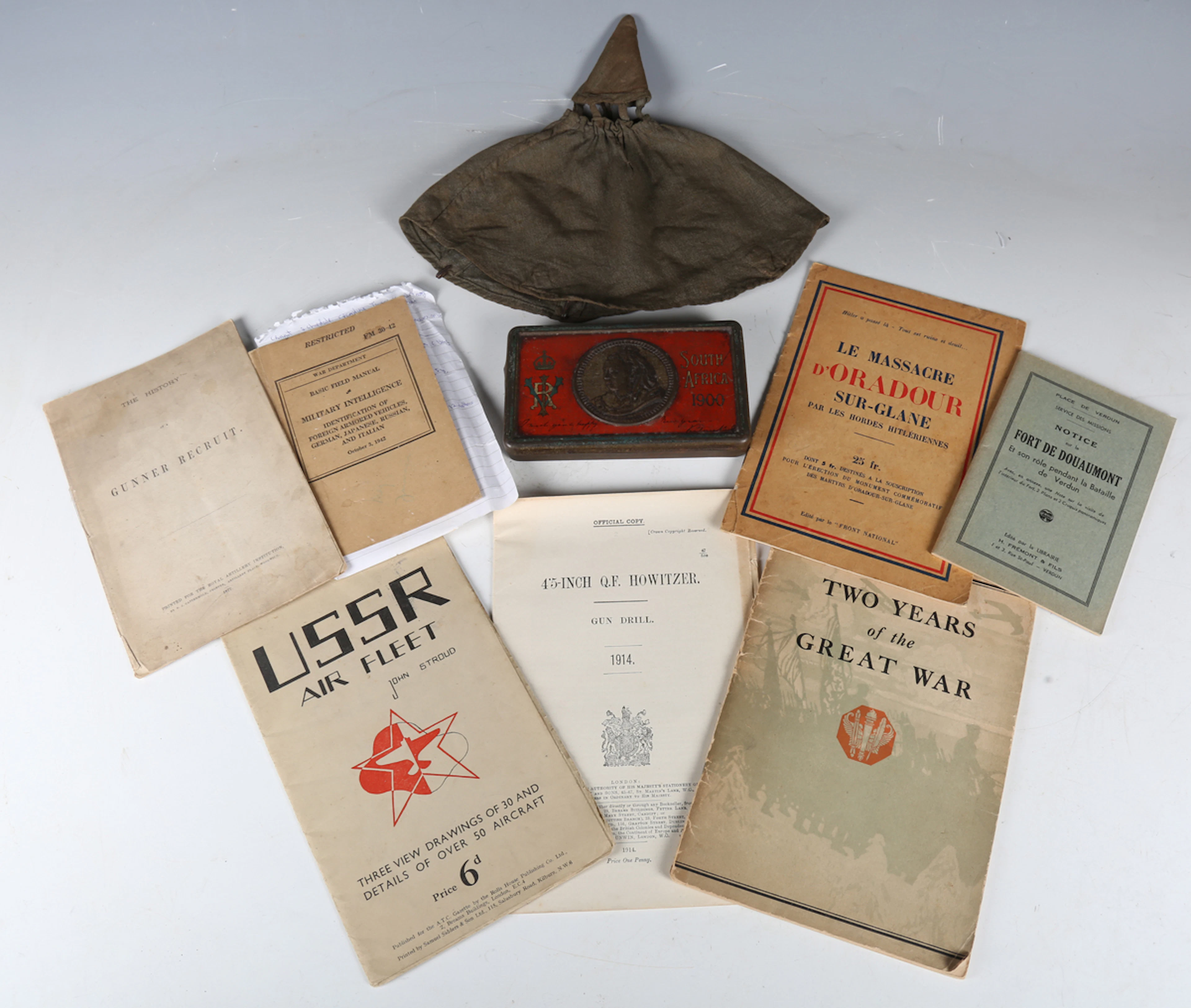 A small group of military collectables and ephemera, including a First