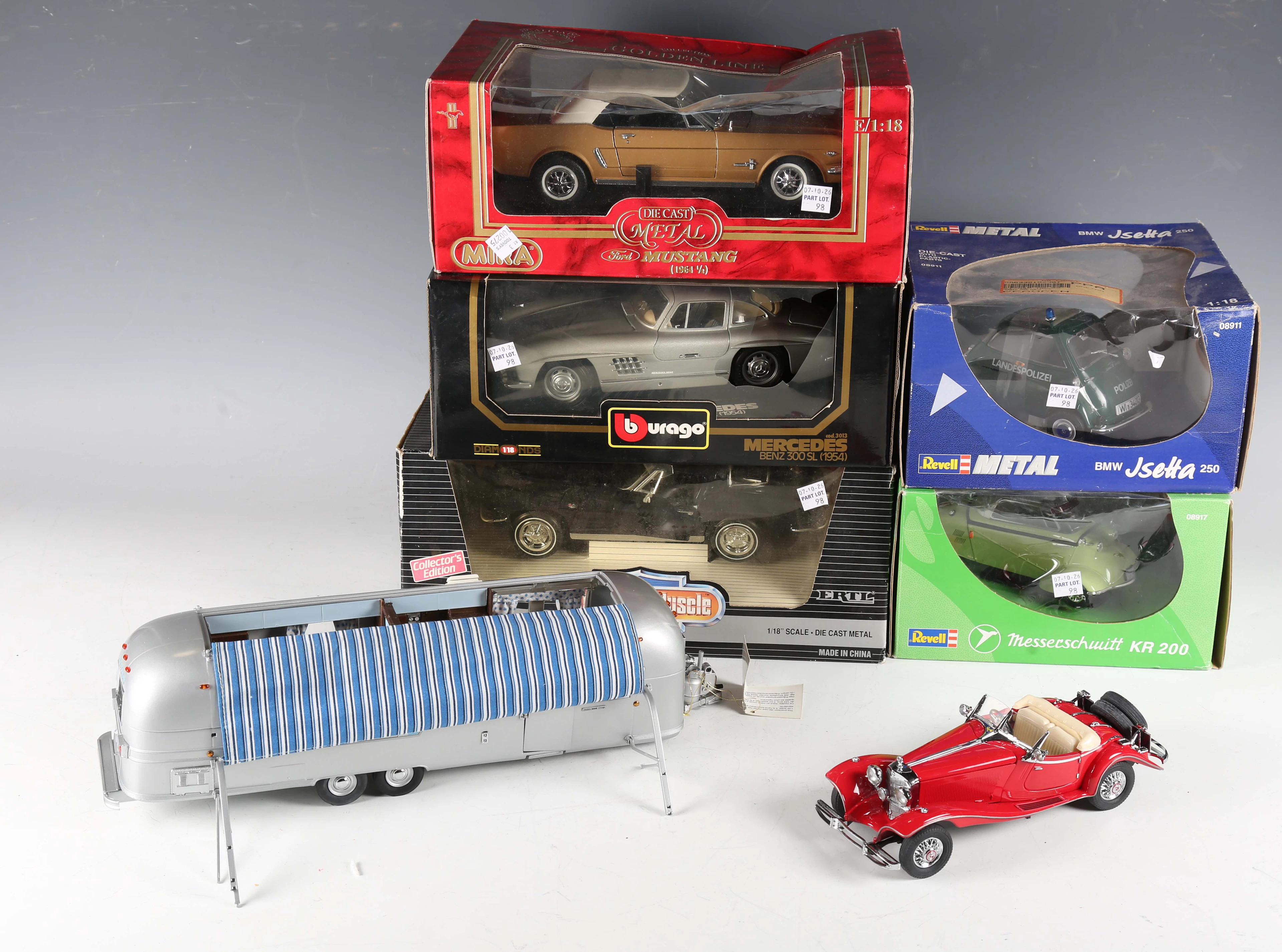 A small group of model vehicles, comprising Franklin Mint Mercedes