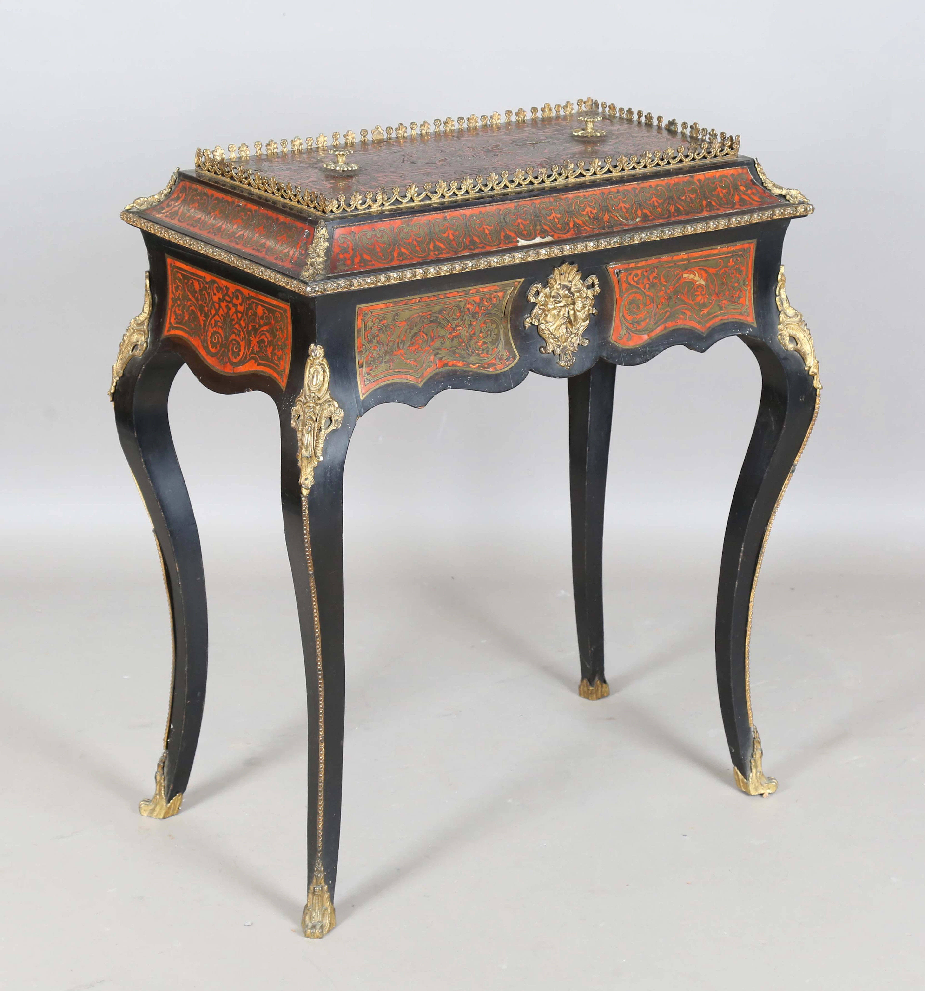 A mid-19th century ebonized and boulle work jardinière table with