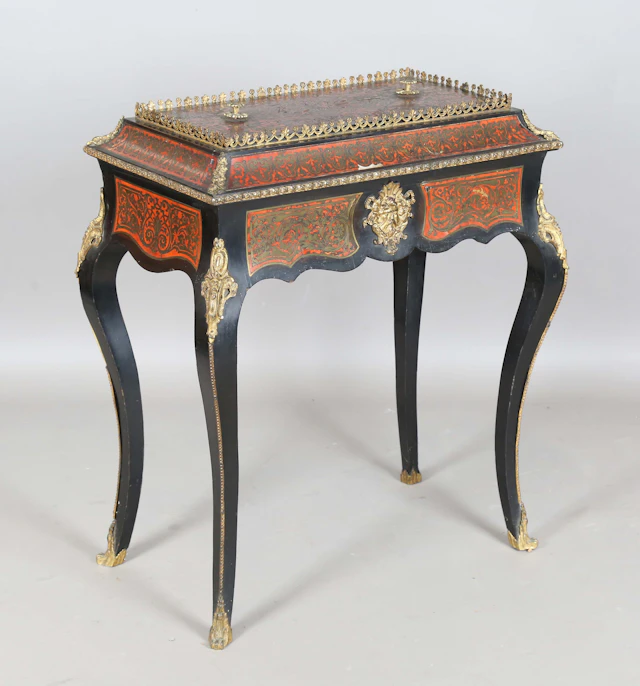 A mid-19th century ebonized and boulle work jardinière table with