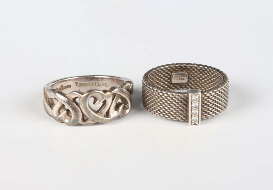 A Tiffany & Co Paloma Picasso ring in a triple heart design, detailed