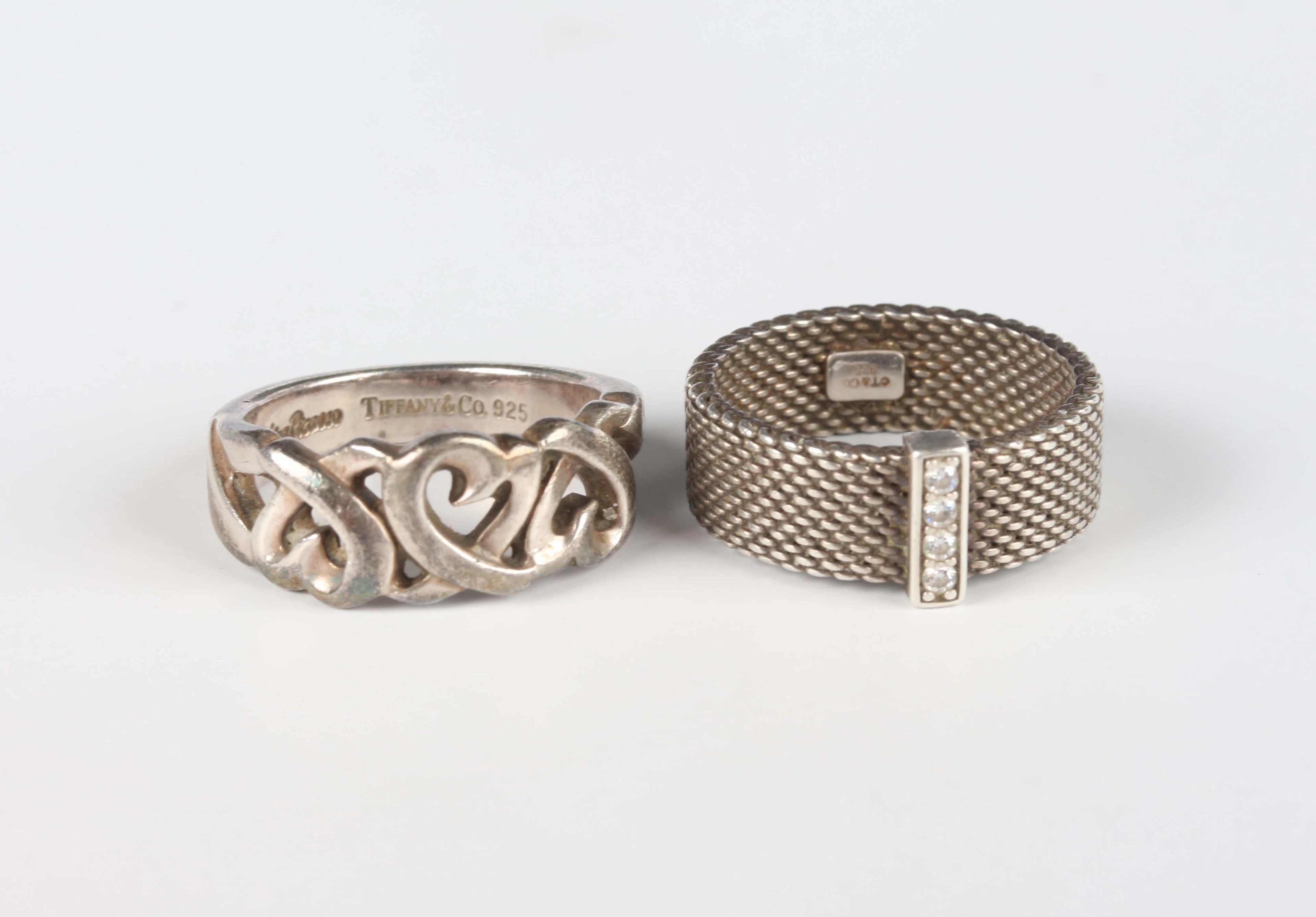 A Tiffany & Co Paloma Picasso ring in a triple heart design, detailed