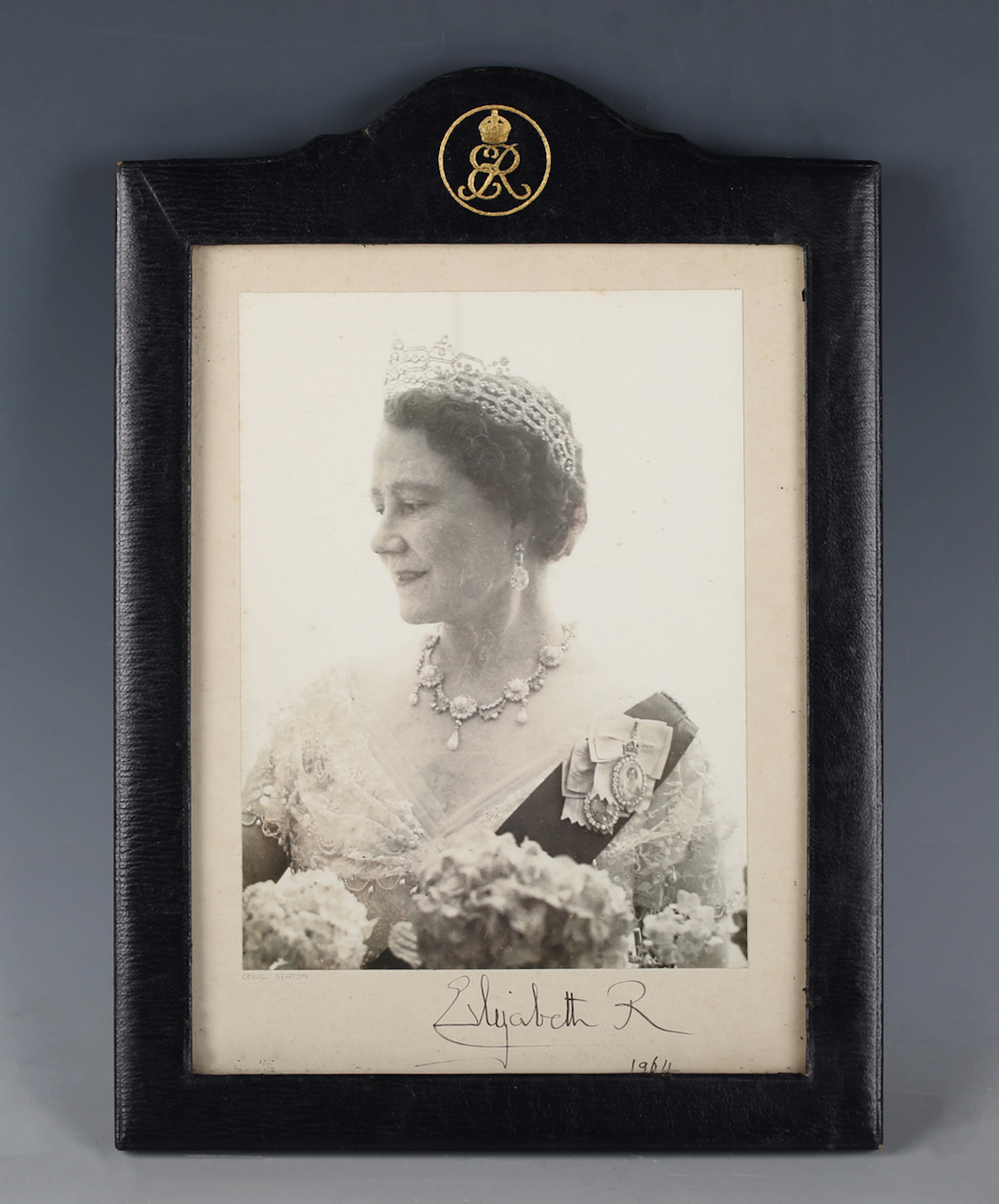 ROYALTY. A mounted black and white presentation photograph of Queen