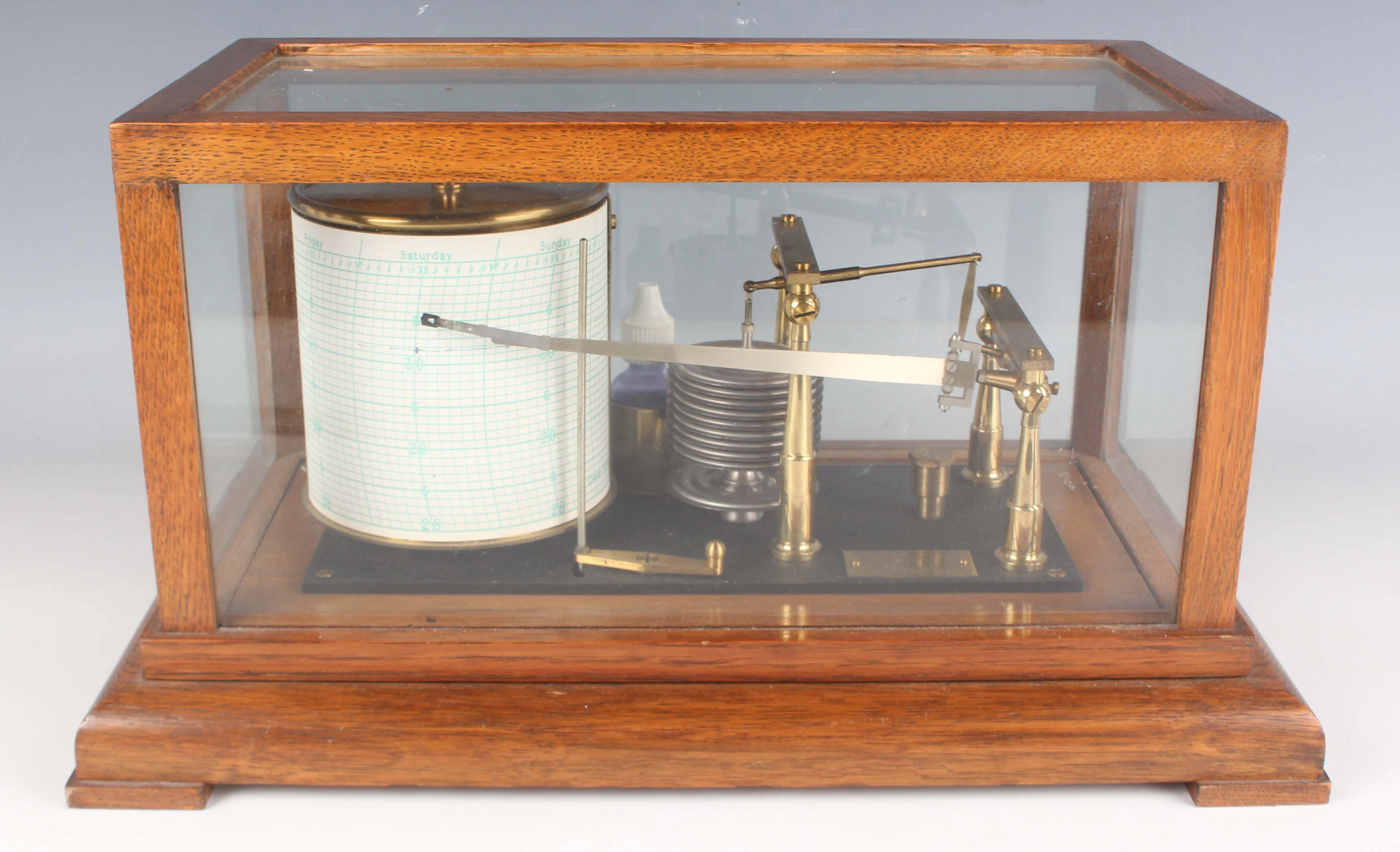 An early 20th century oak cased barograph by Negretti & Zambra London