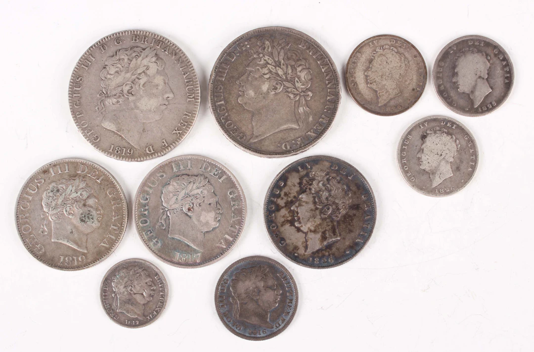 A collection of 19th century silver coinage, including a George III