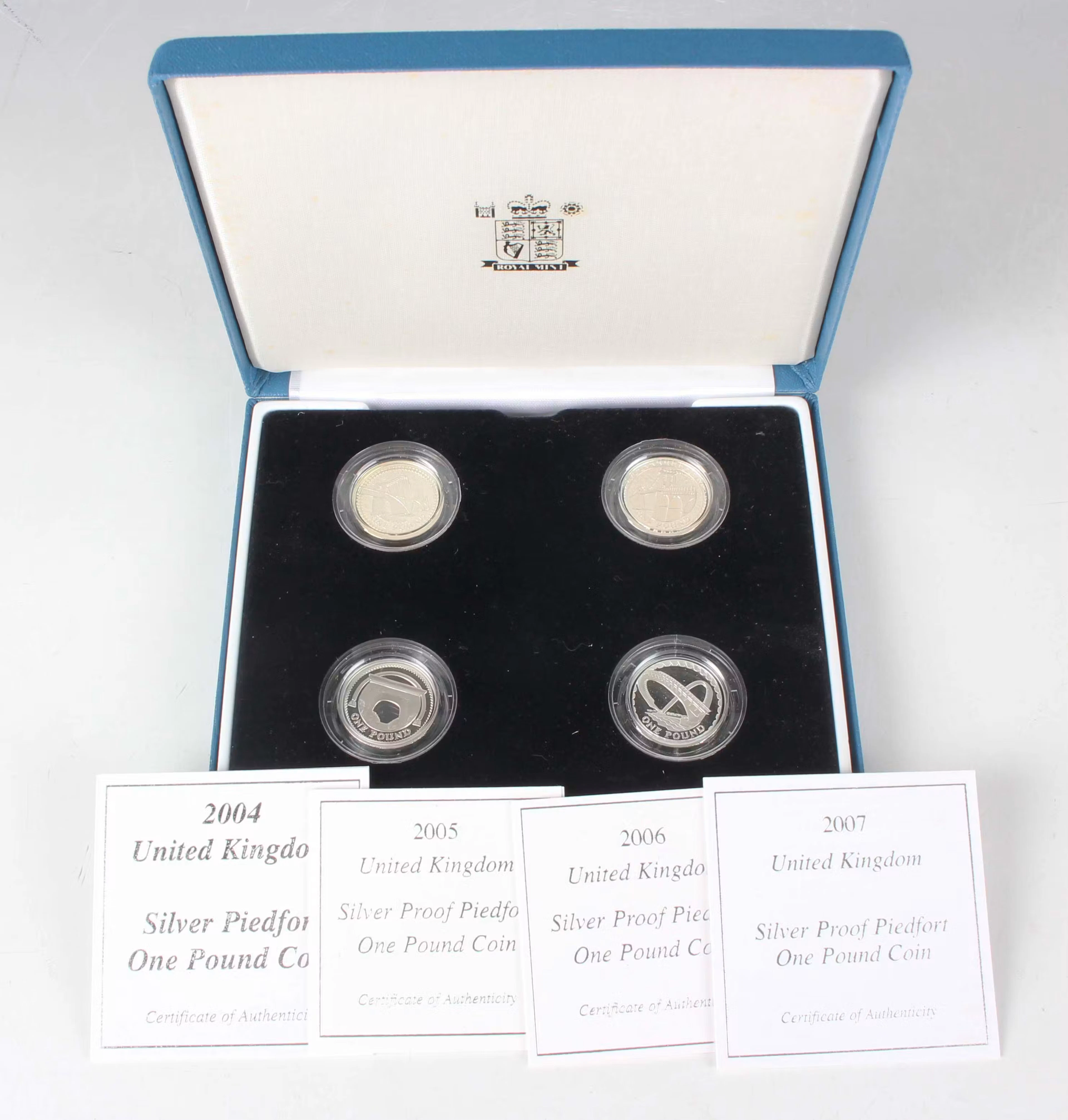 An Elizabeth II Royal Mint silver proof piedfort one pound four-coin