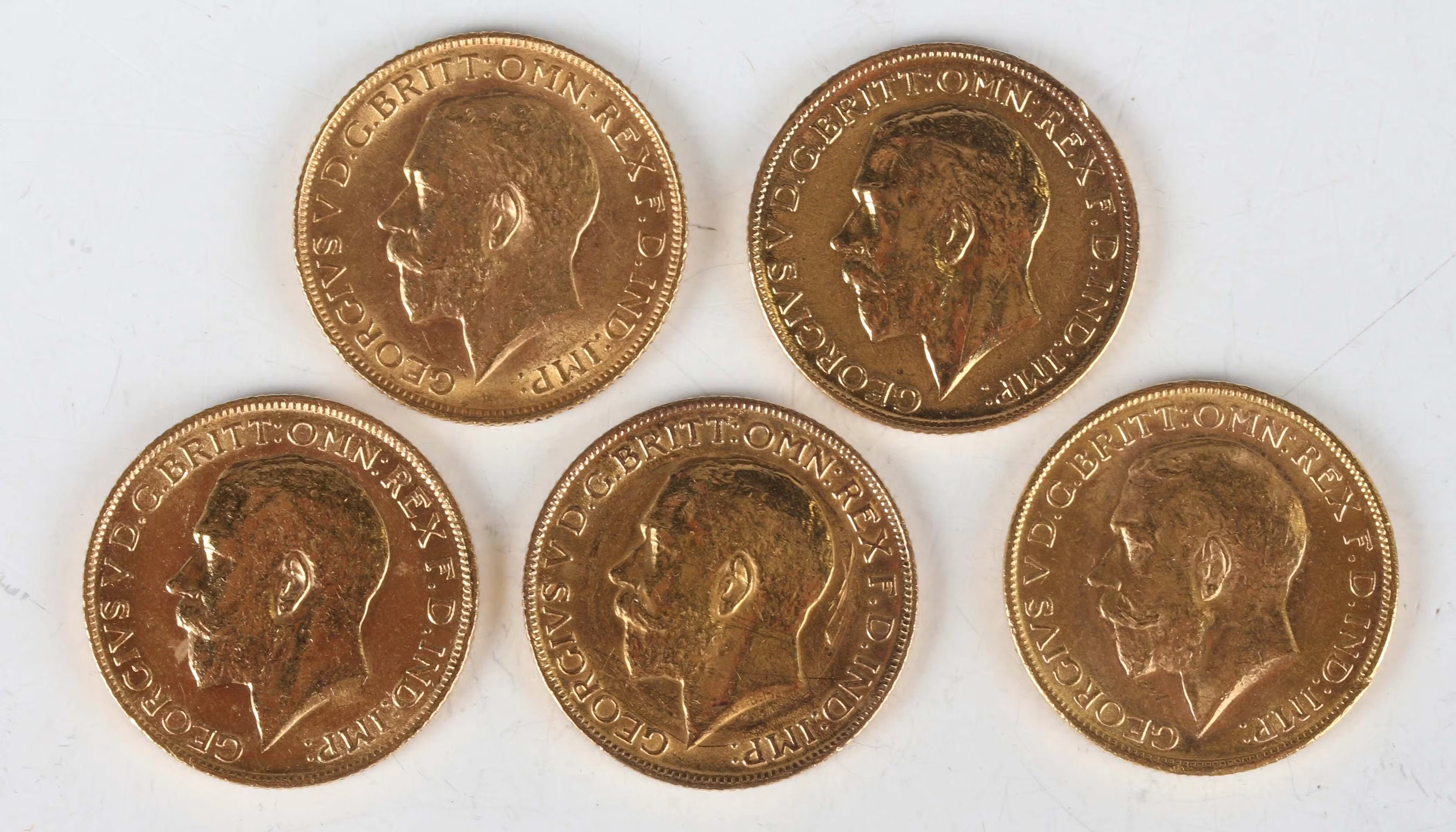 A group of five George V sovereigns, comprising 1911, 1912, 1913