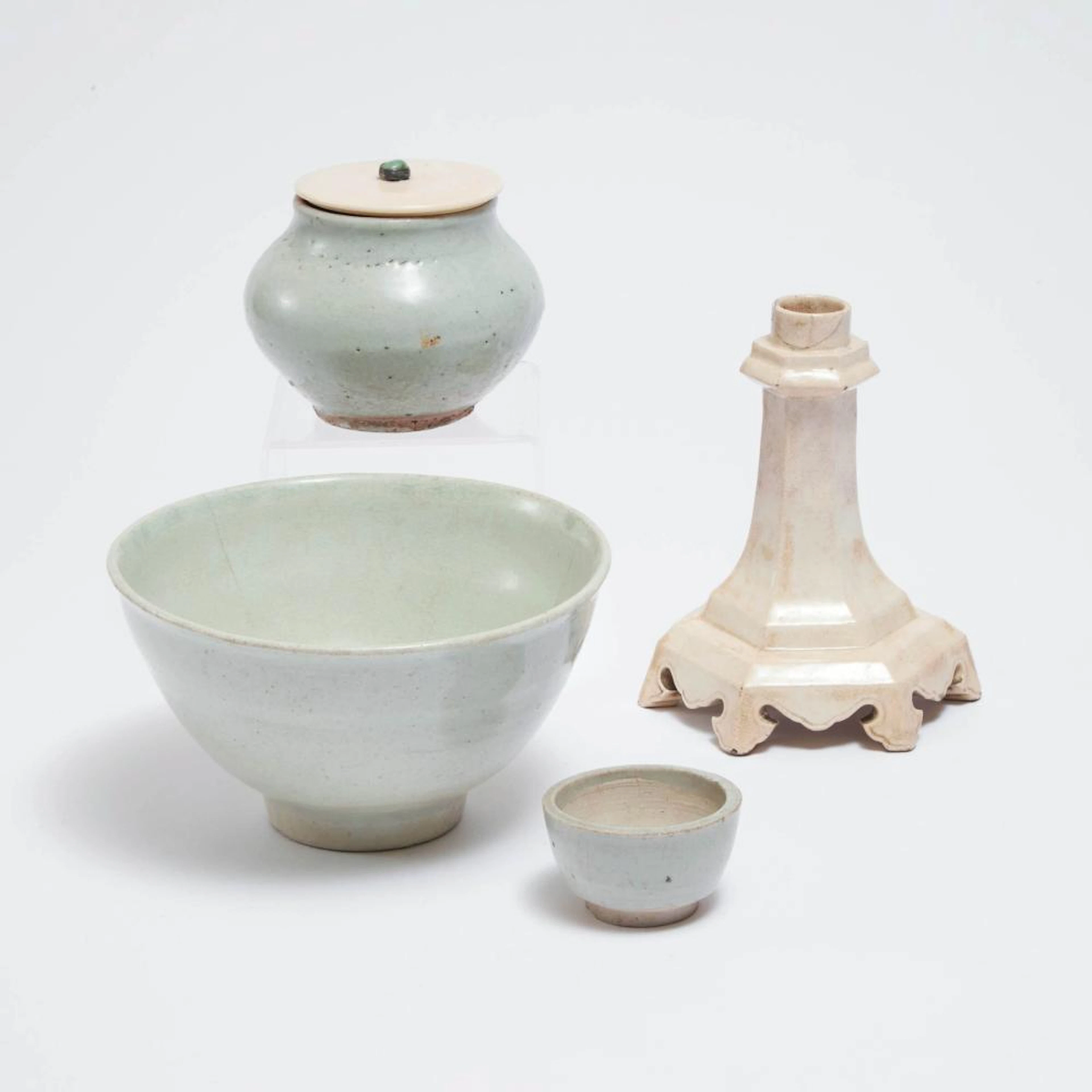 A Group of Four Korean Celadon and Pale-Glazed Wares, Joseon Dynasty