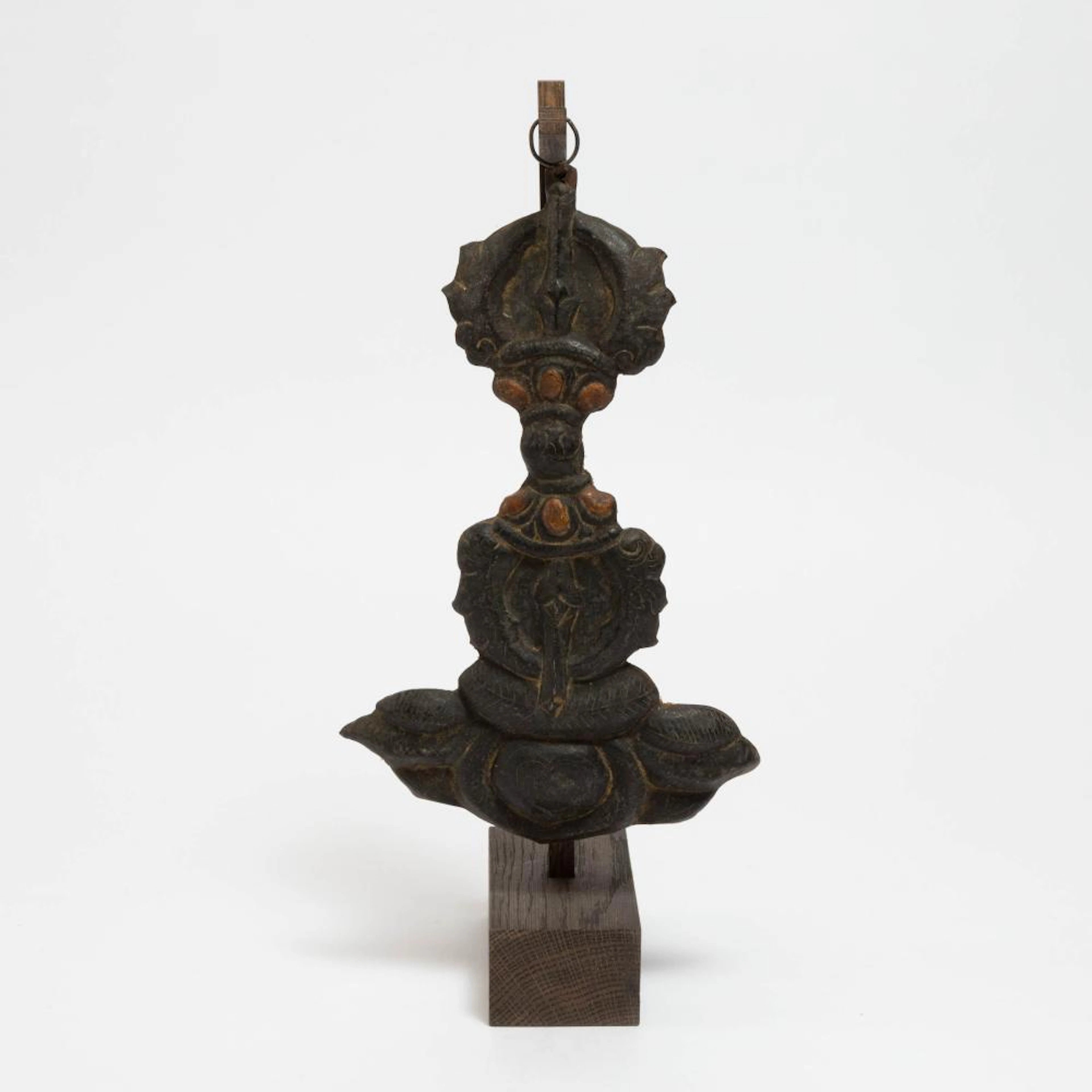 A Gilt-Decorated and Silver-Inlaid Bronze Repoussé Vajra Ornament