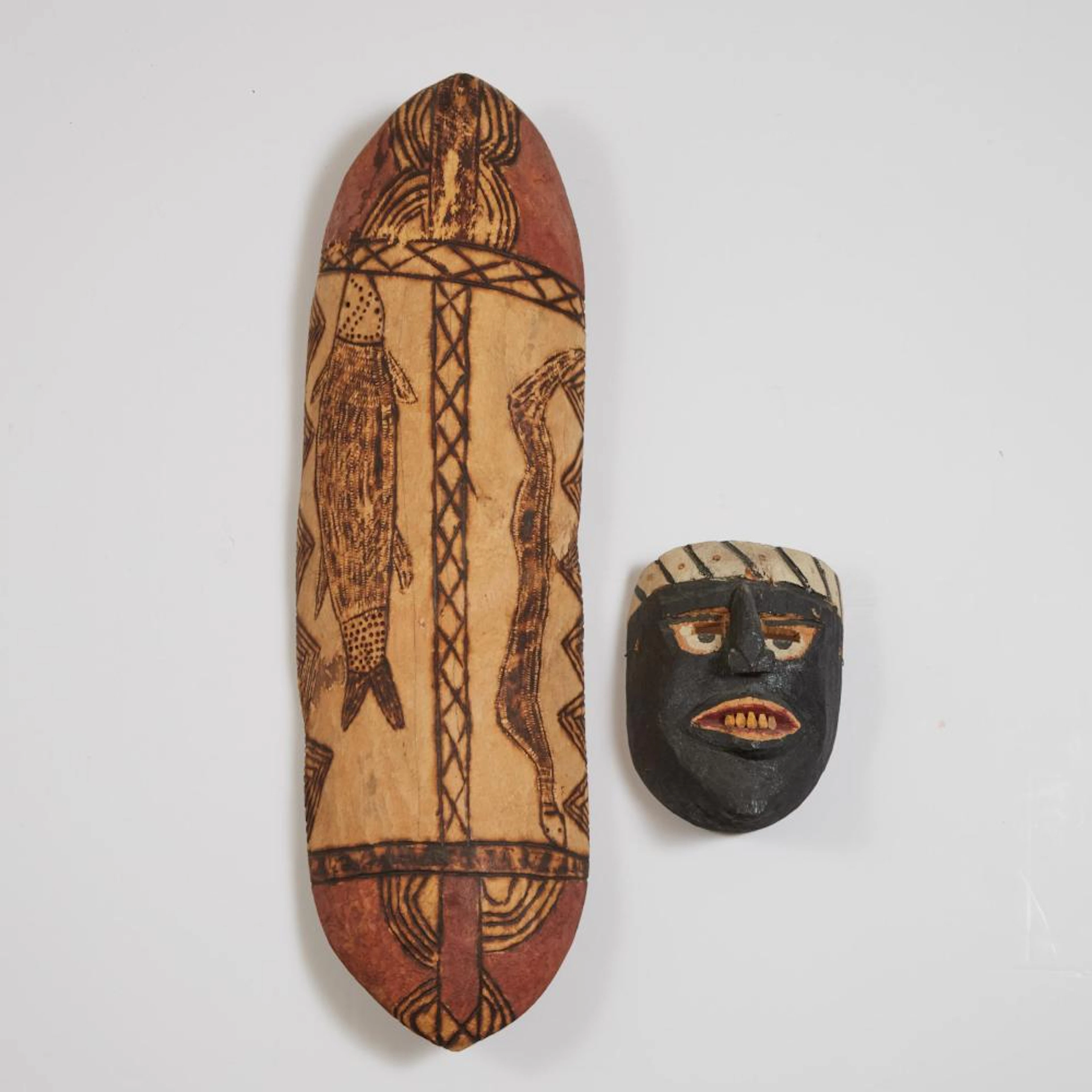 Australian Aboriginal Coolamon (Carrying Vessel) together with a South