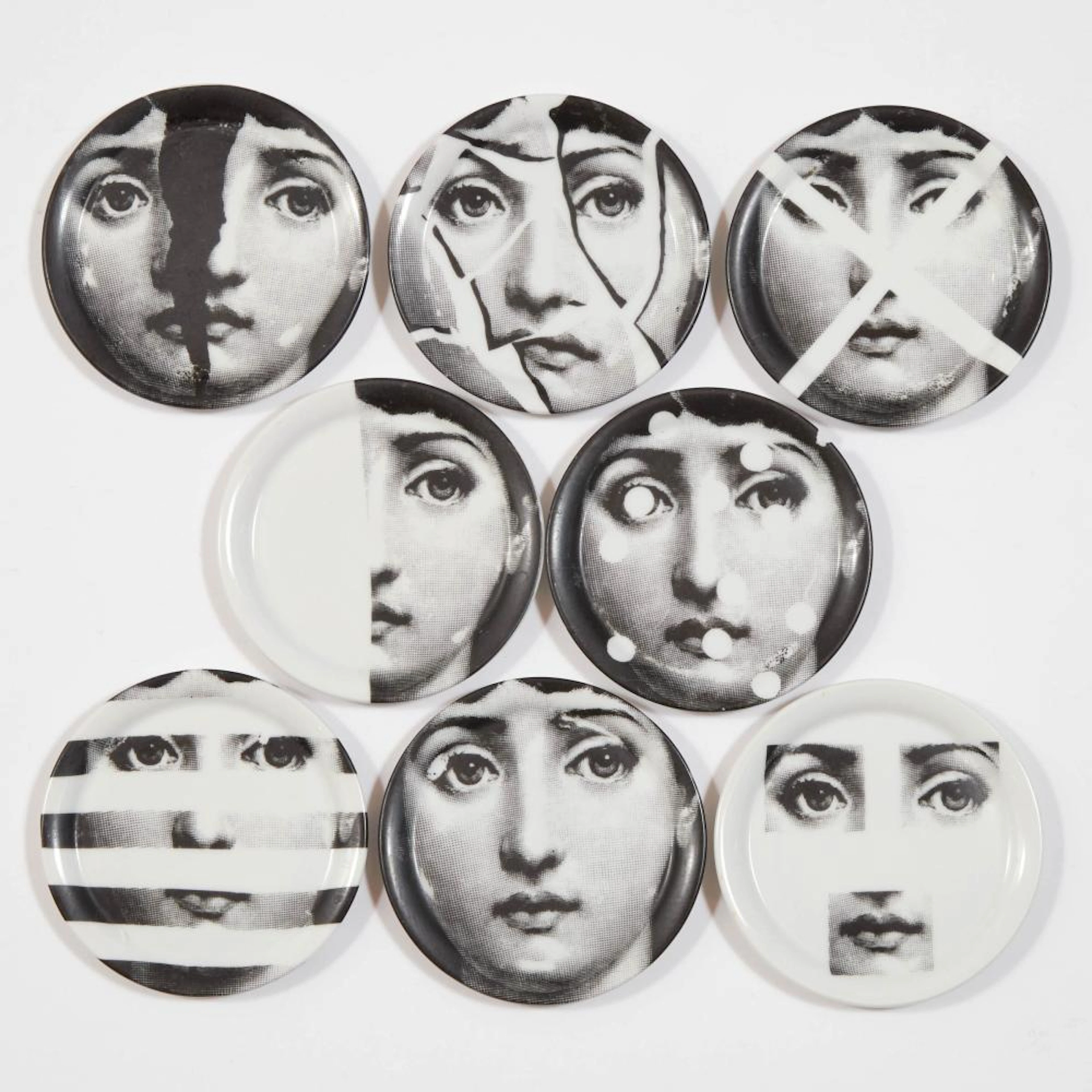 Eight Piero Fornasetti 'Tema E Variazioni' Coasters, 20th century
