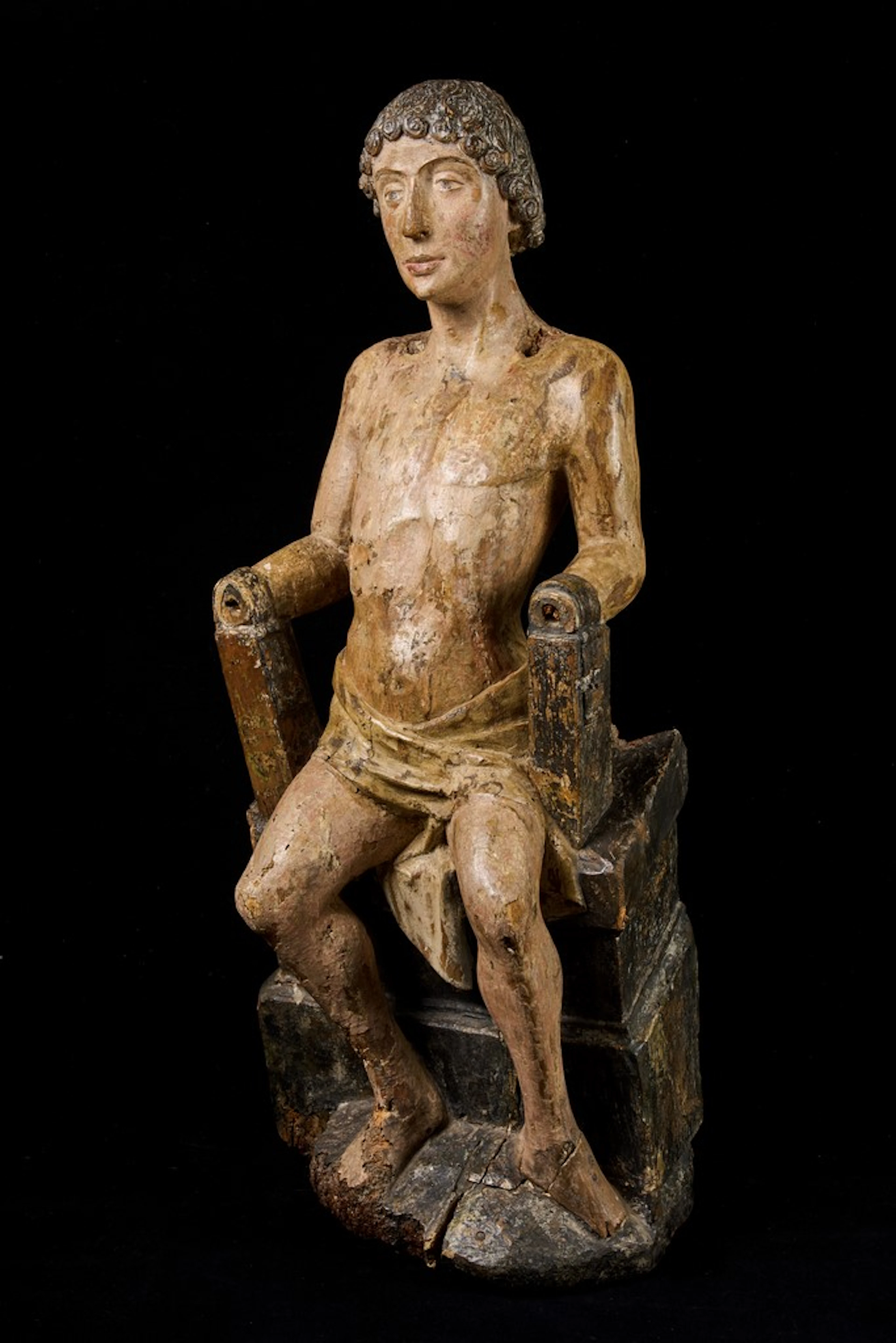 Saint Quentin en chêne sculpté et polychromé. Le saint est représenté