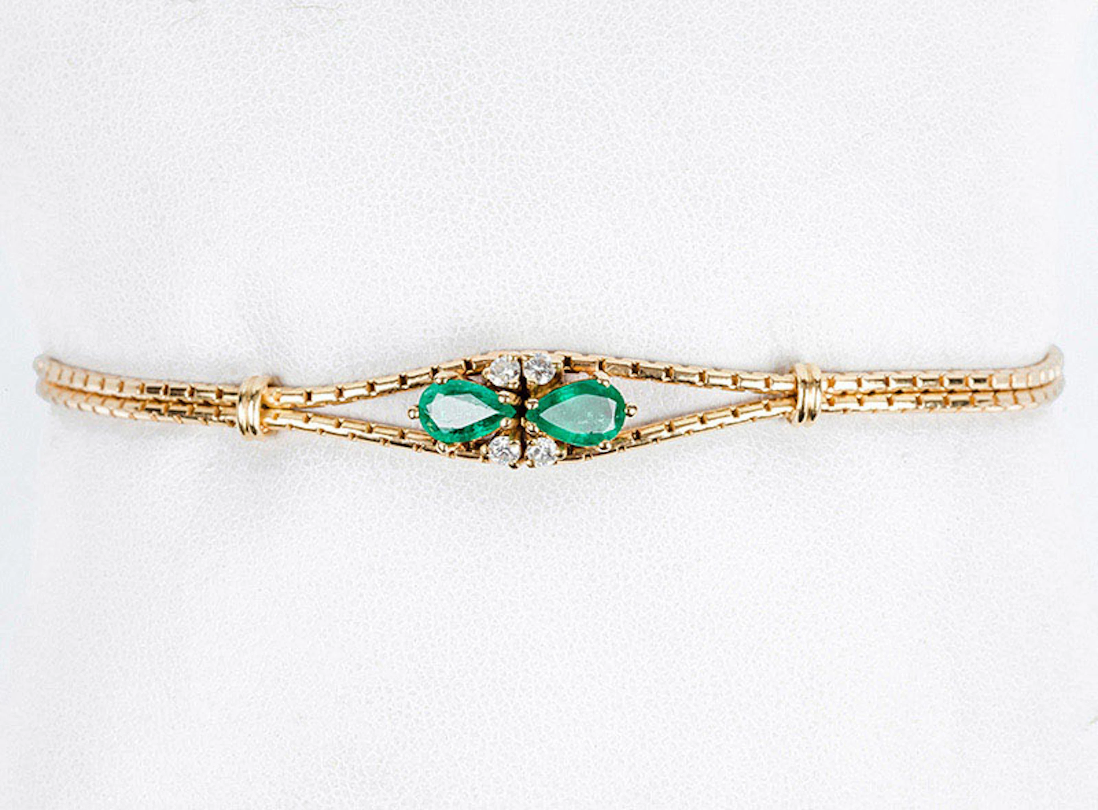 Pulsera en doble cordón de oro amarillo 18 K con centro...