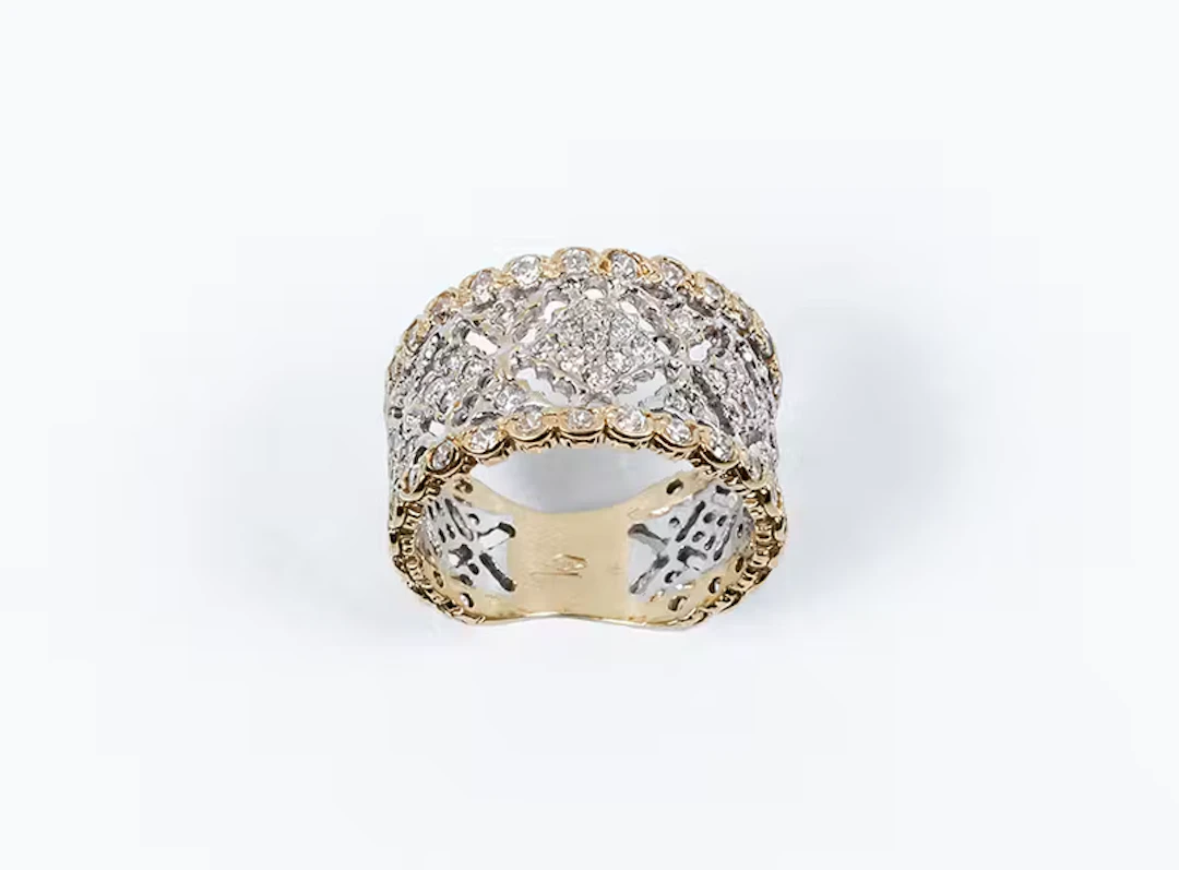 Sortija en oro amarillo y blanco 18 K con motivo...
